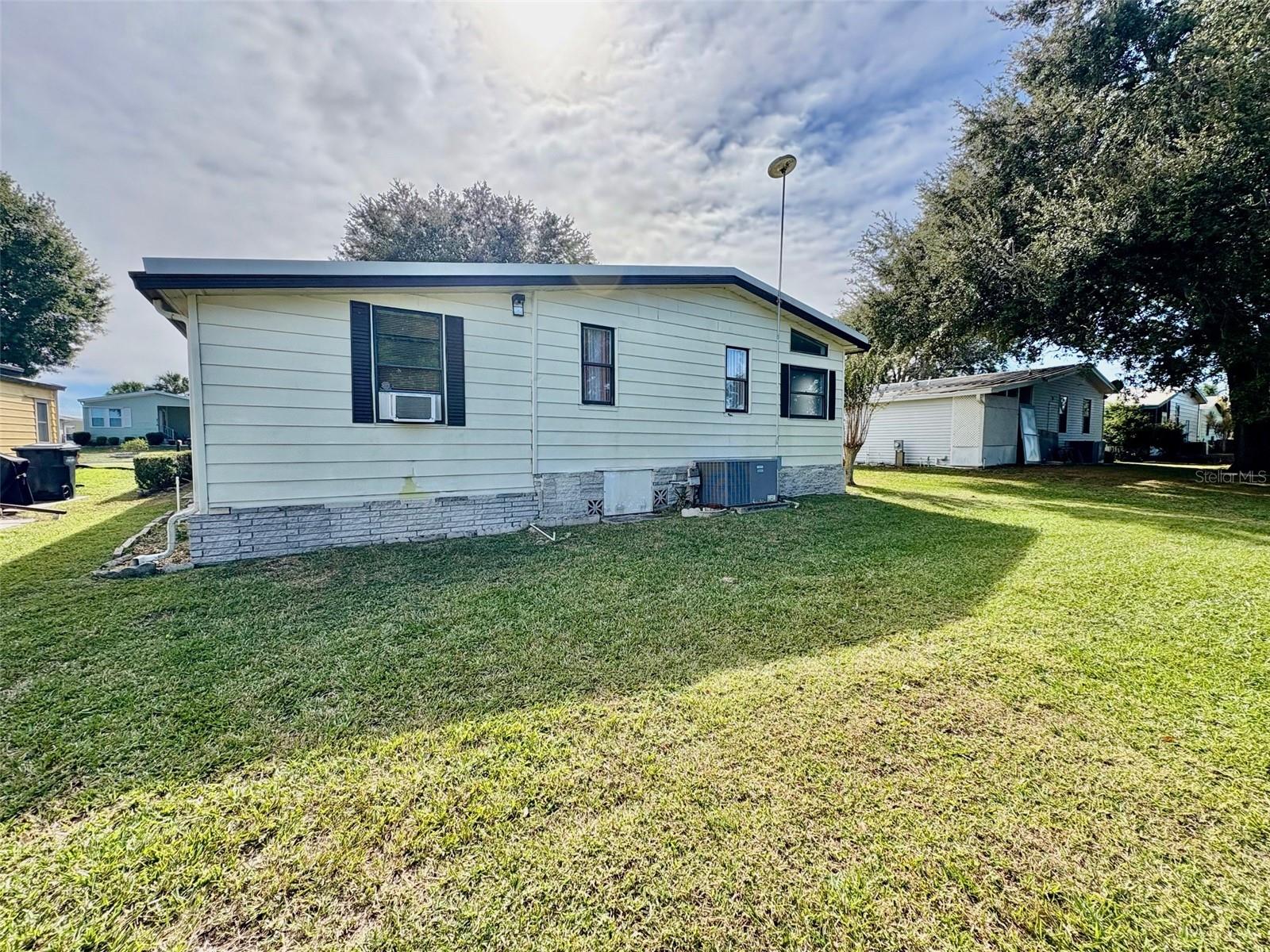 Back of house - 6315 GROVE POINTE DR SE, WINTER HAVEN