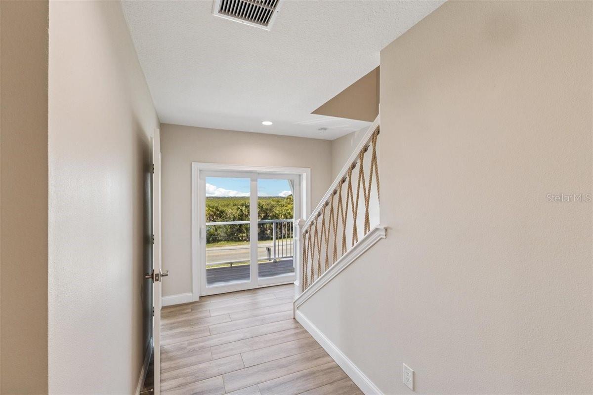 2nd Floor hallway/balcony - 6191 TURTLEMOUND RD, NEW SMYRNA BEACH