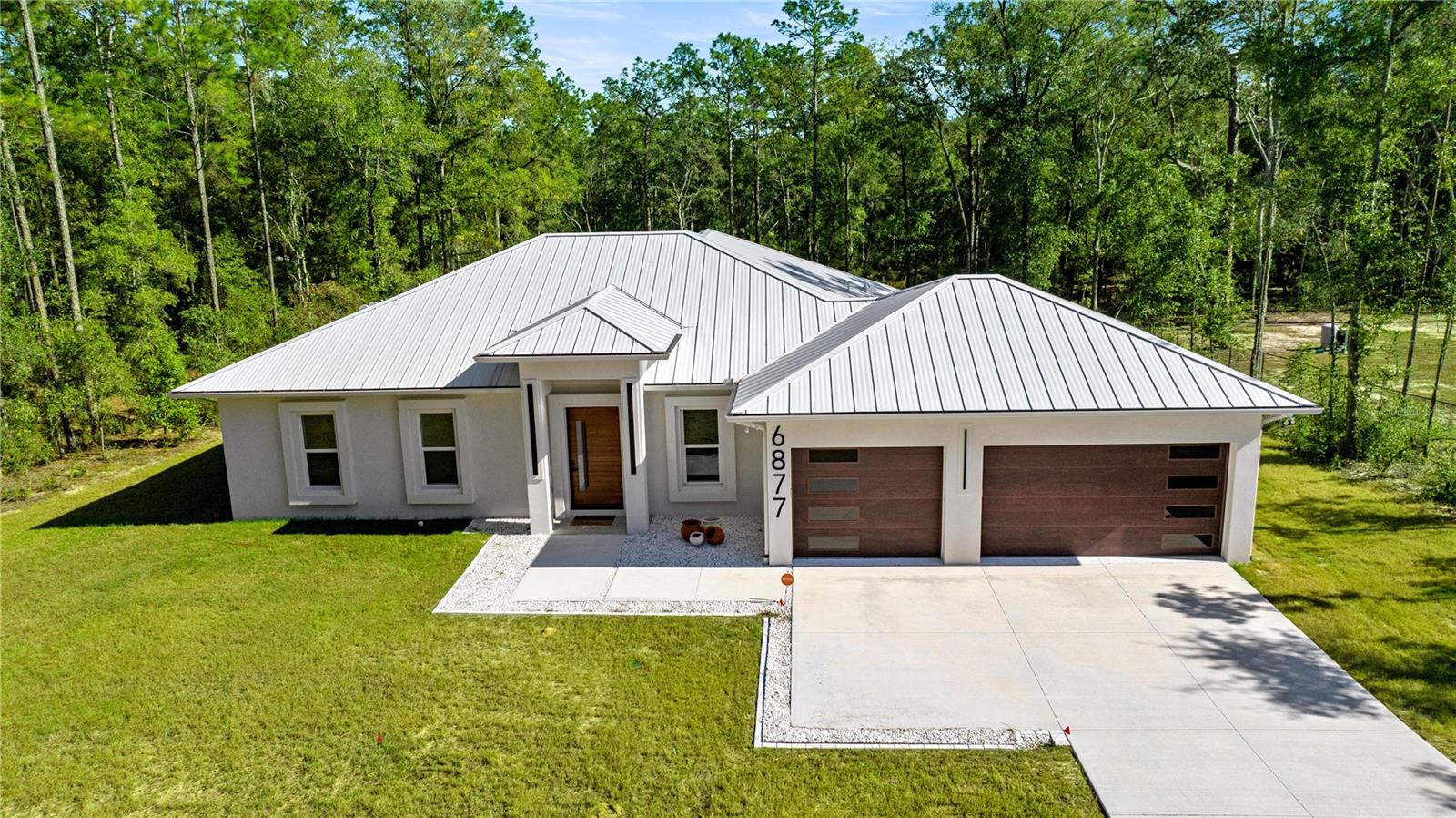 AERIAL VIEW OF THE FRONT OF THE HOUSE - 6877 SW 131ST CIR, OCALA