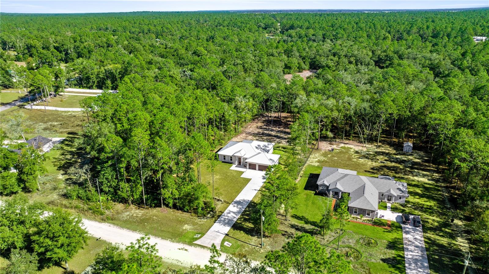 AERIAL VIEW OF THE COMPLETE PROPERTY AND NEIGHBORHOOD - 6877 SW 131ST CIR, OCALA