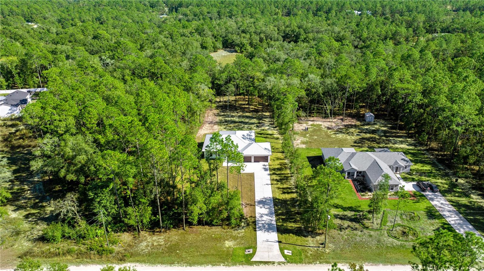 AERIAL VIEW OF THE COMPLETE PROPERTY AND NEIGHBORHOOD - 6877 SW 131ST CIR, OCALA