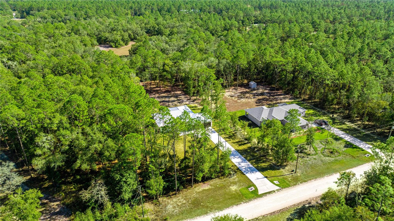 AERIAL VIEW OF THE COMPLETE PROPERTY AND NEIGHBORHOOD - 6877 SW 131ST CIR, OCALA