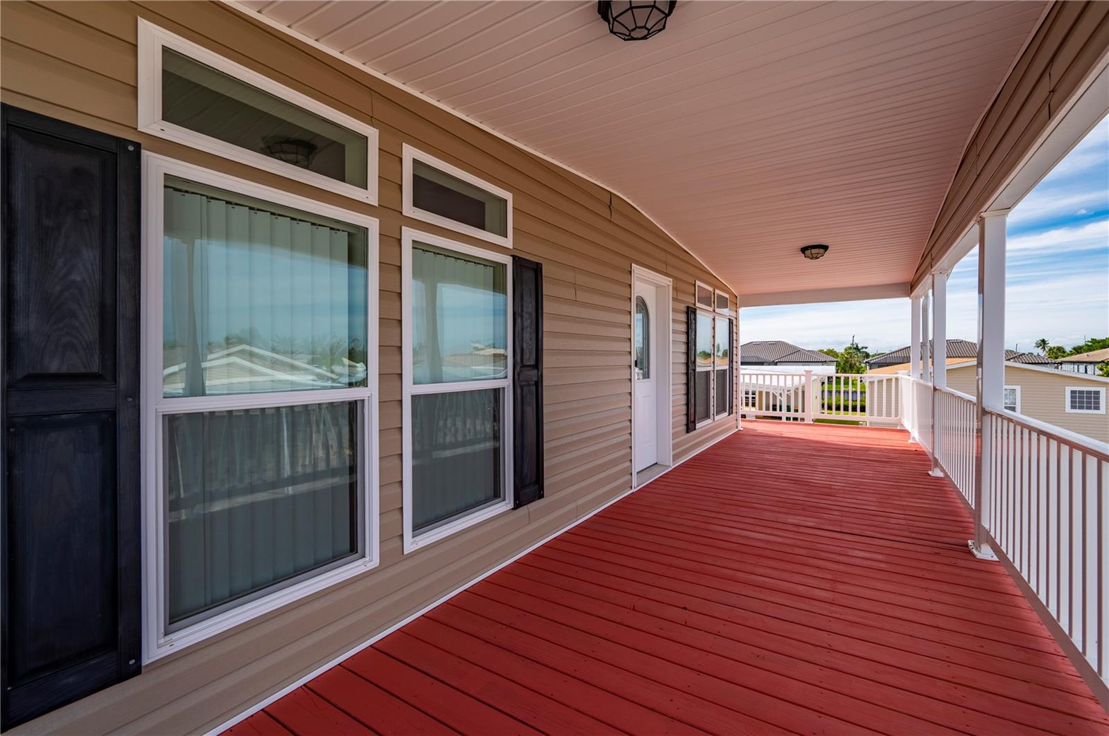 Large covered front porch - 67 WINDMILL BLVD, PUNTA GORDA