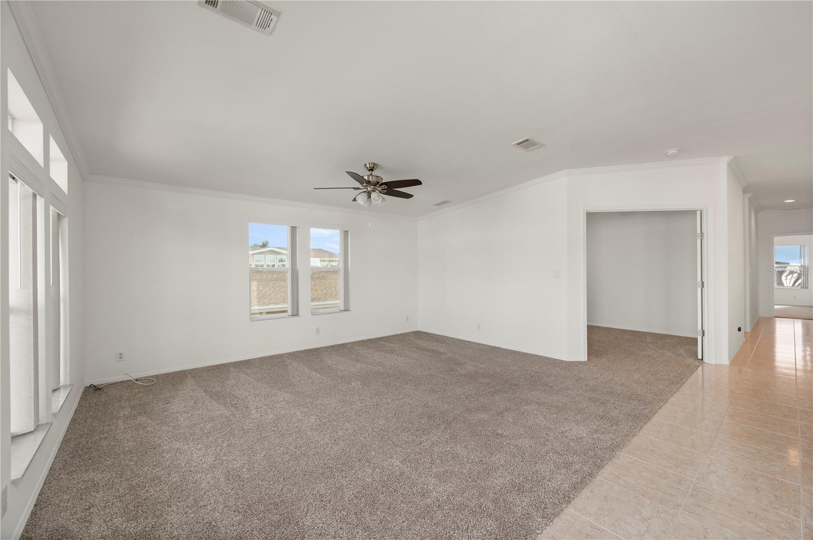Living Room and Double door to BONUS room / office / 3rd bedroom... you decide! - 67 WINDMILL BLVD, PUNTA GORDA