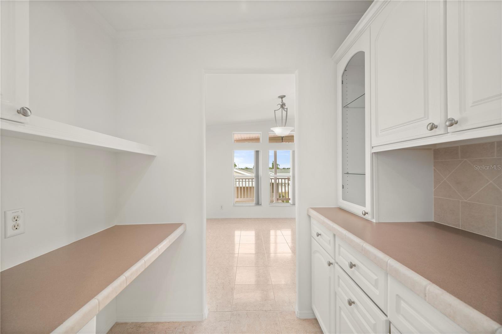 Butler Pantry view to dining room - 67 WINDMILL BLVD, PUNTA GORDA