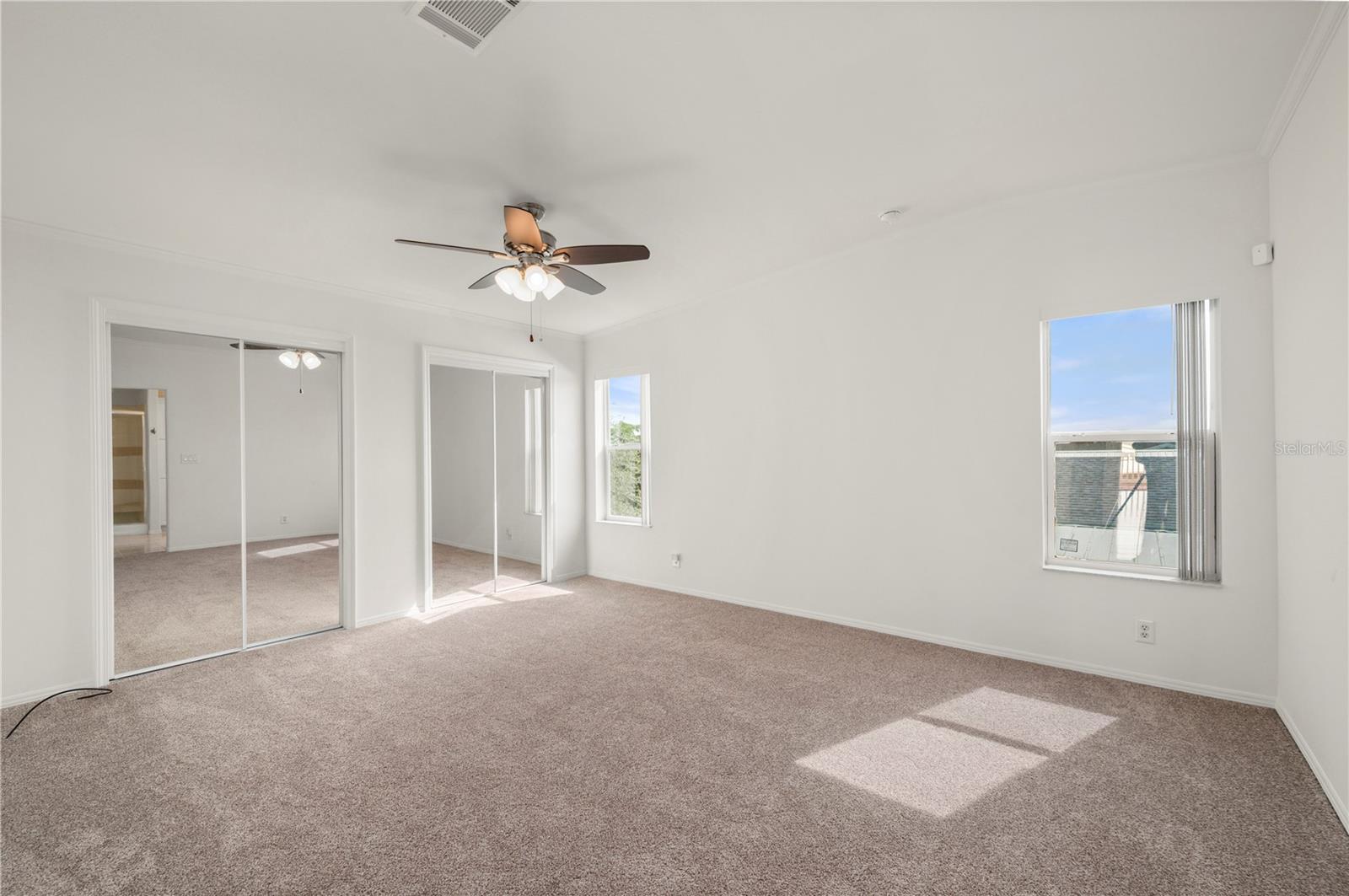 Main Bedroom, twin built in closets and a separate walk-in closet in the en suite bathroom - 67 WINDMILL BLVD, PUNTA GORDA