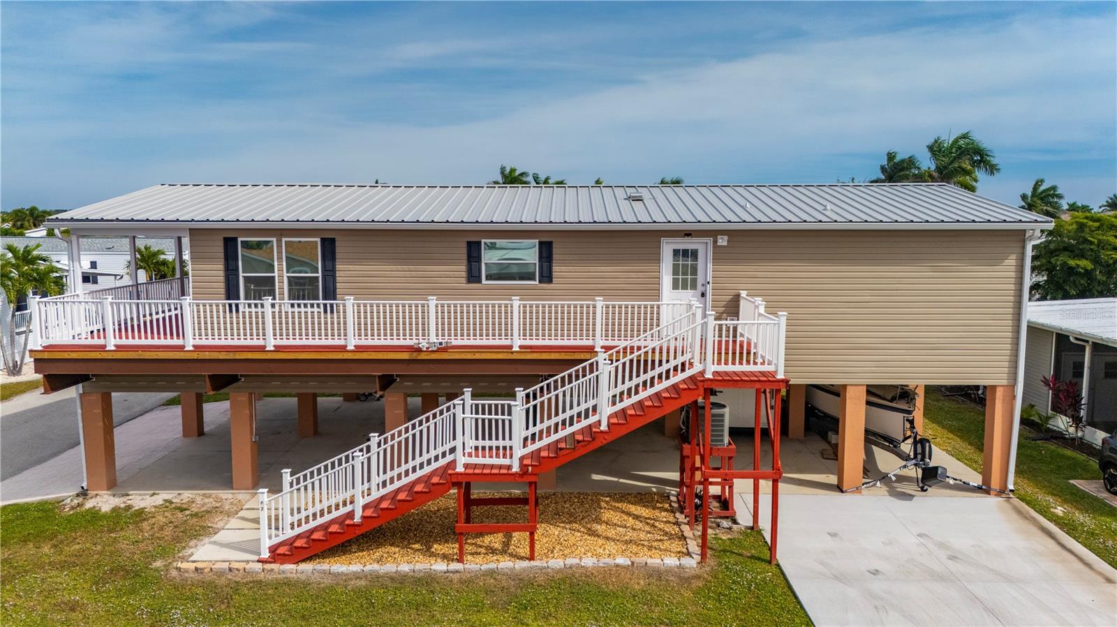 Side view - 67 WINDMILL BLVD, PUNTA GORDA