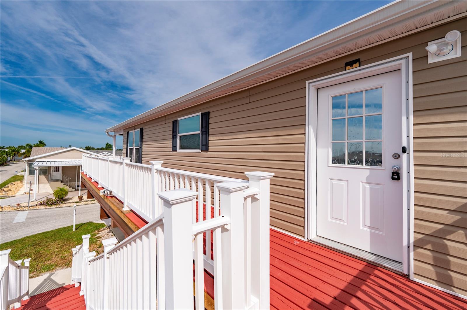 Side entry door - 67 WINDMILL BLVD, PUNTA GORDA