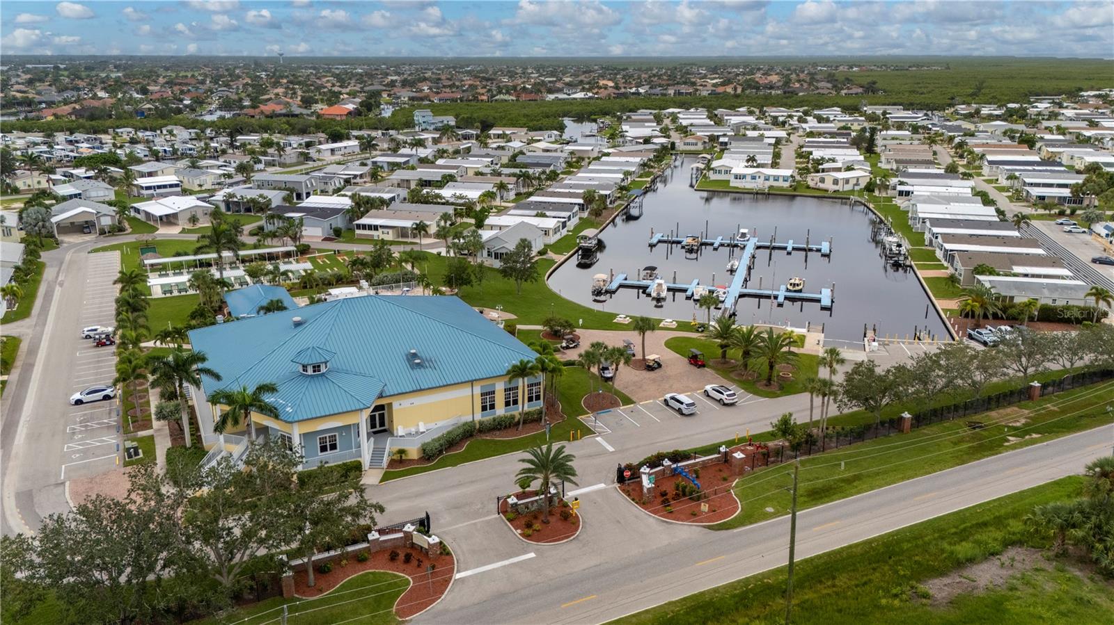 Gated entrance - 67 WINDMILL BLVD, PUNTA GORDA