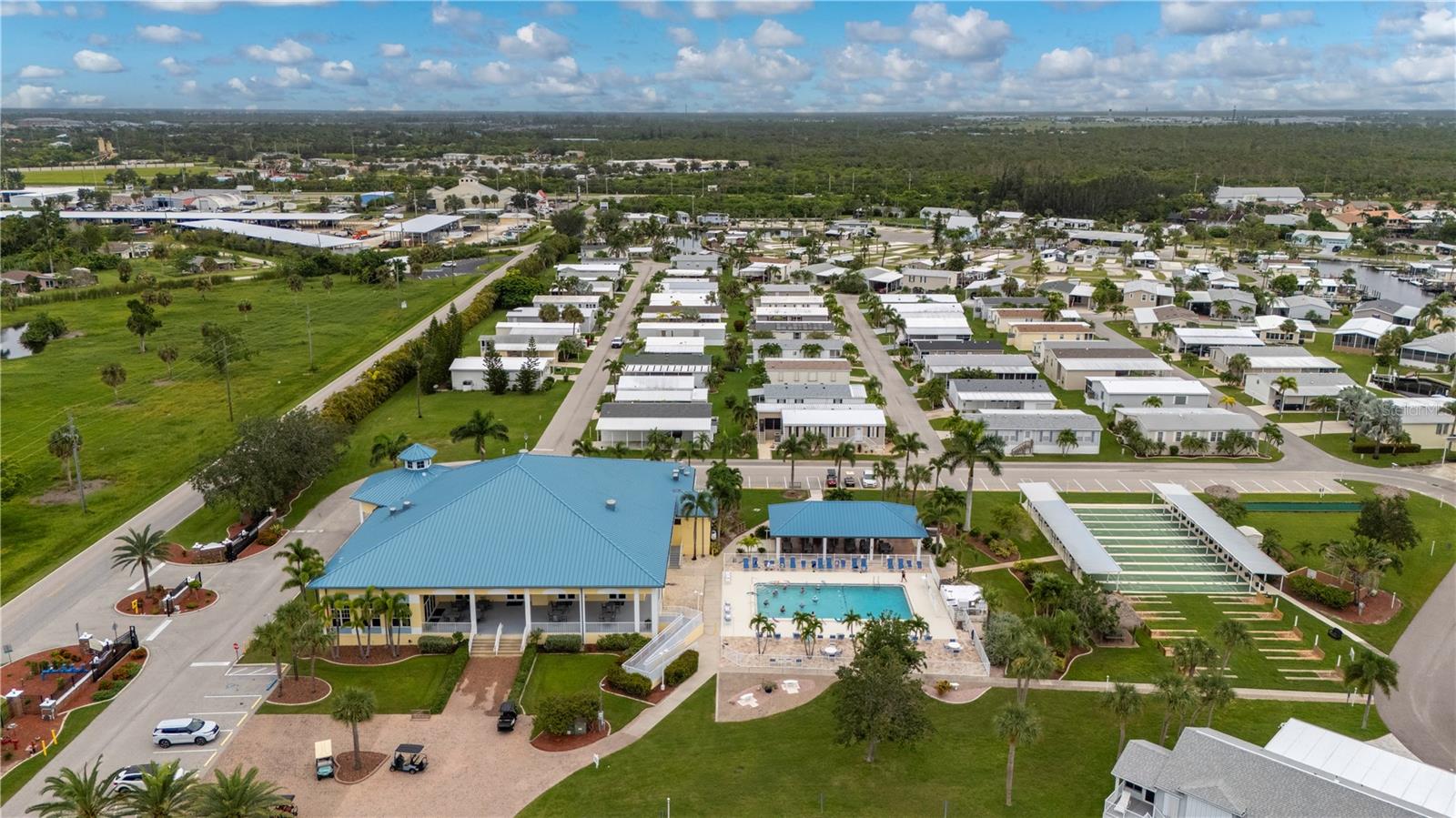 Aerial of Community Clubhouse, Pool and amenities - 67 WINDMILL BLVD, PUNTA GORDA