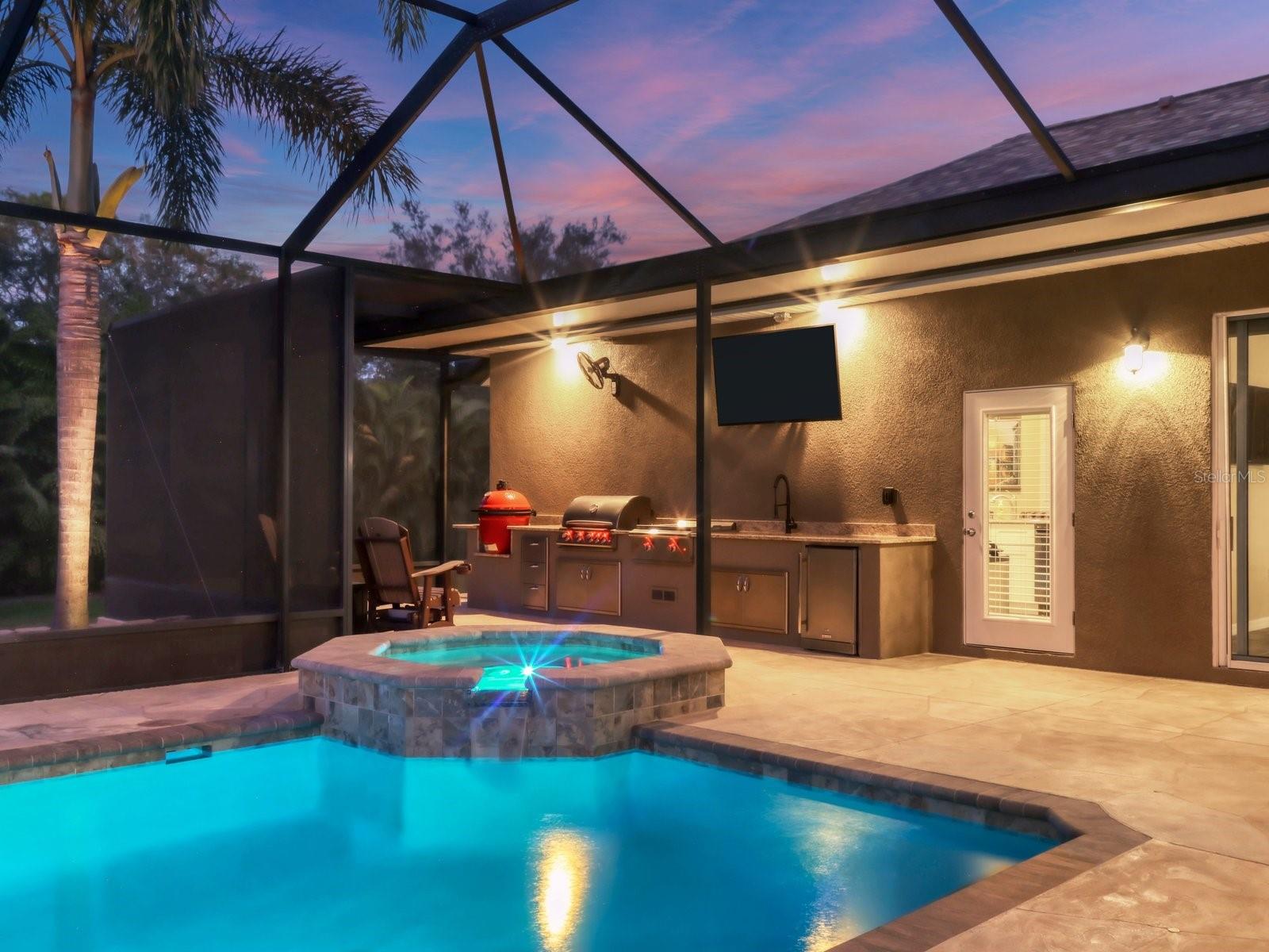 a large 14x28 ft Saltwater Pool with a sun shelf - 17706 BRIDLEWOOD CT, PARRISH