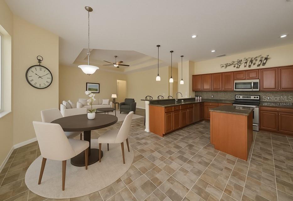 Virtually staged main kitchen area - 17706 BRIDLEWOOD CT, PARRISH