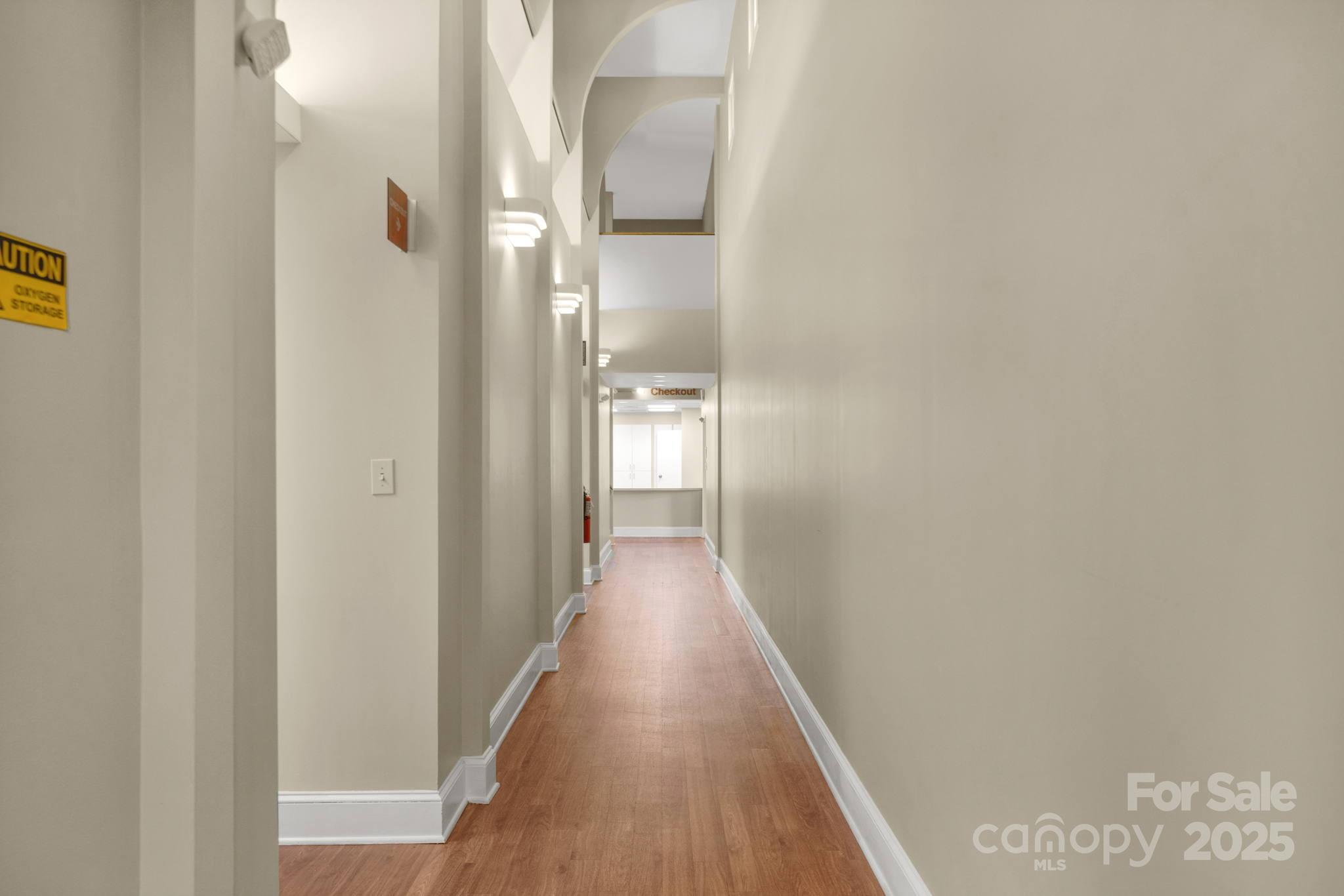 hallway exam rooms are off of - 1201 Colonial Commons Court, Lancaster