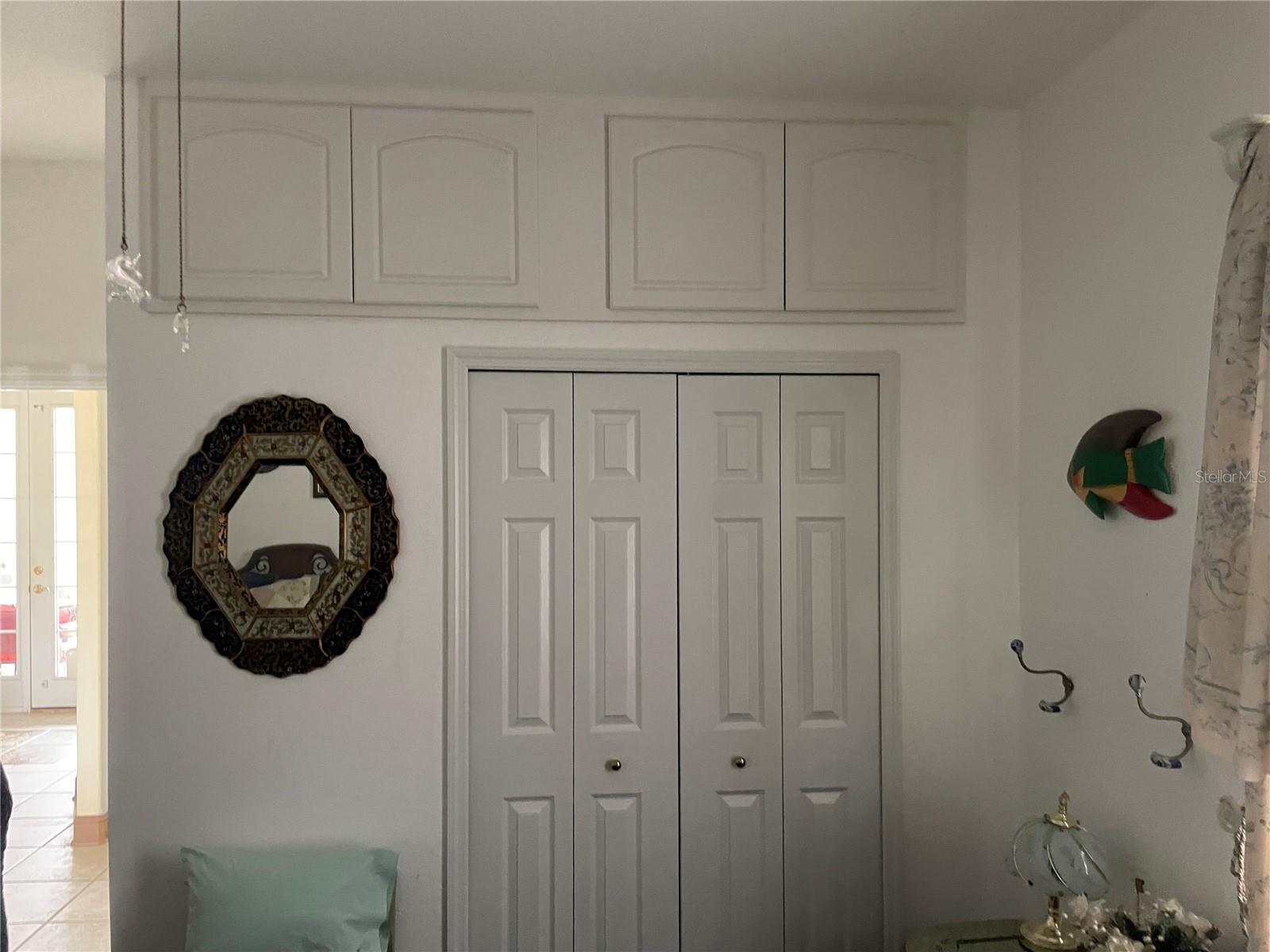 3RD BEDROOM CLOSET AND OVERHEAD STORAGE - 18029 OHARA DR, PORT CHARLOTTE