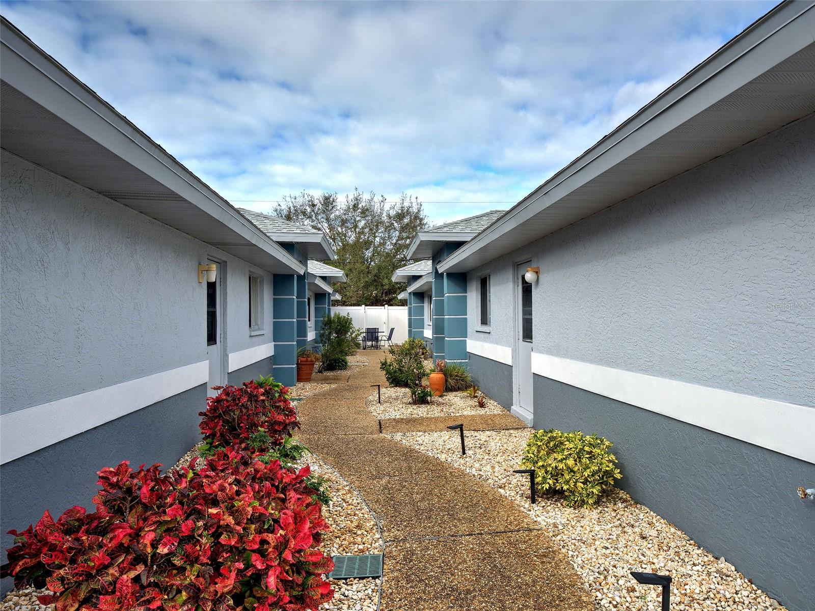 walkway to villa - 6527 HAMLET DR #26B, ENGLEWOOD