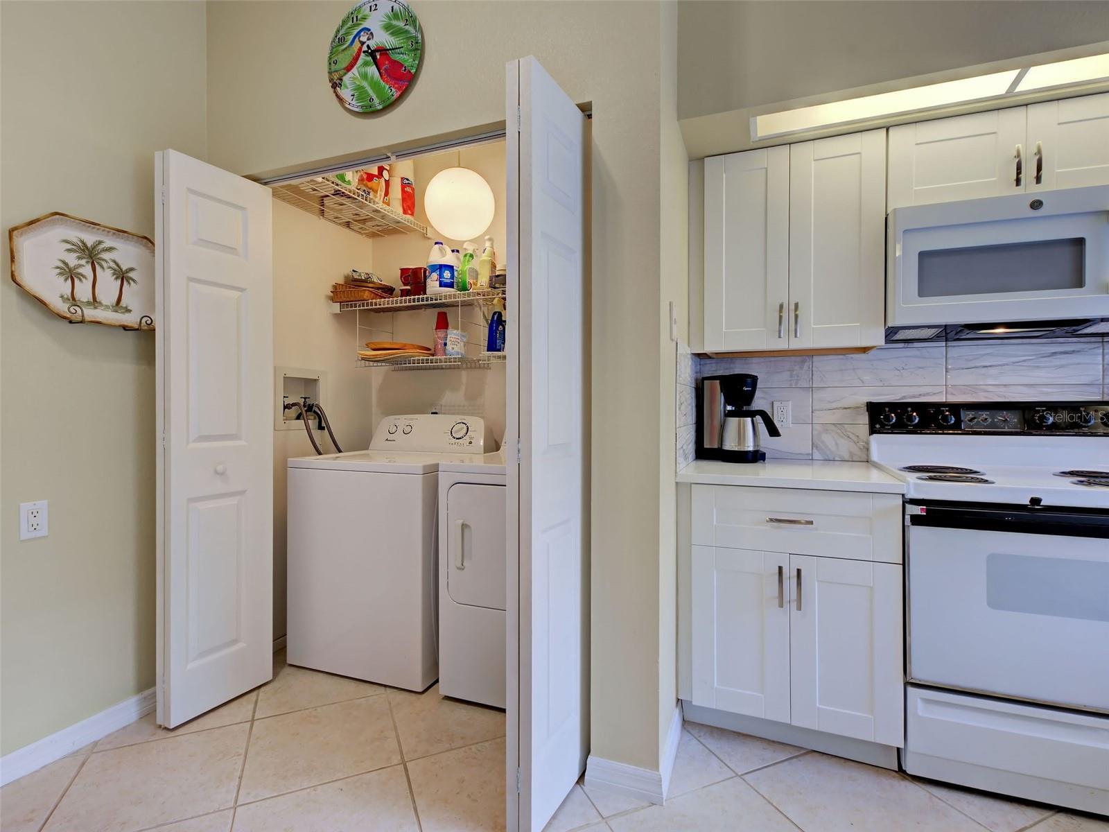 washer/dryer closet with storage - 6527 HAMLET DR #26B, ENGLEWOOD