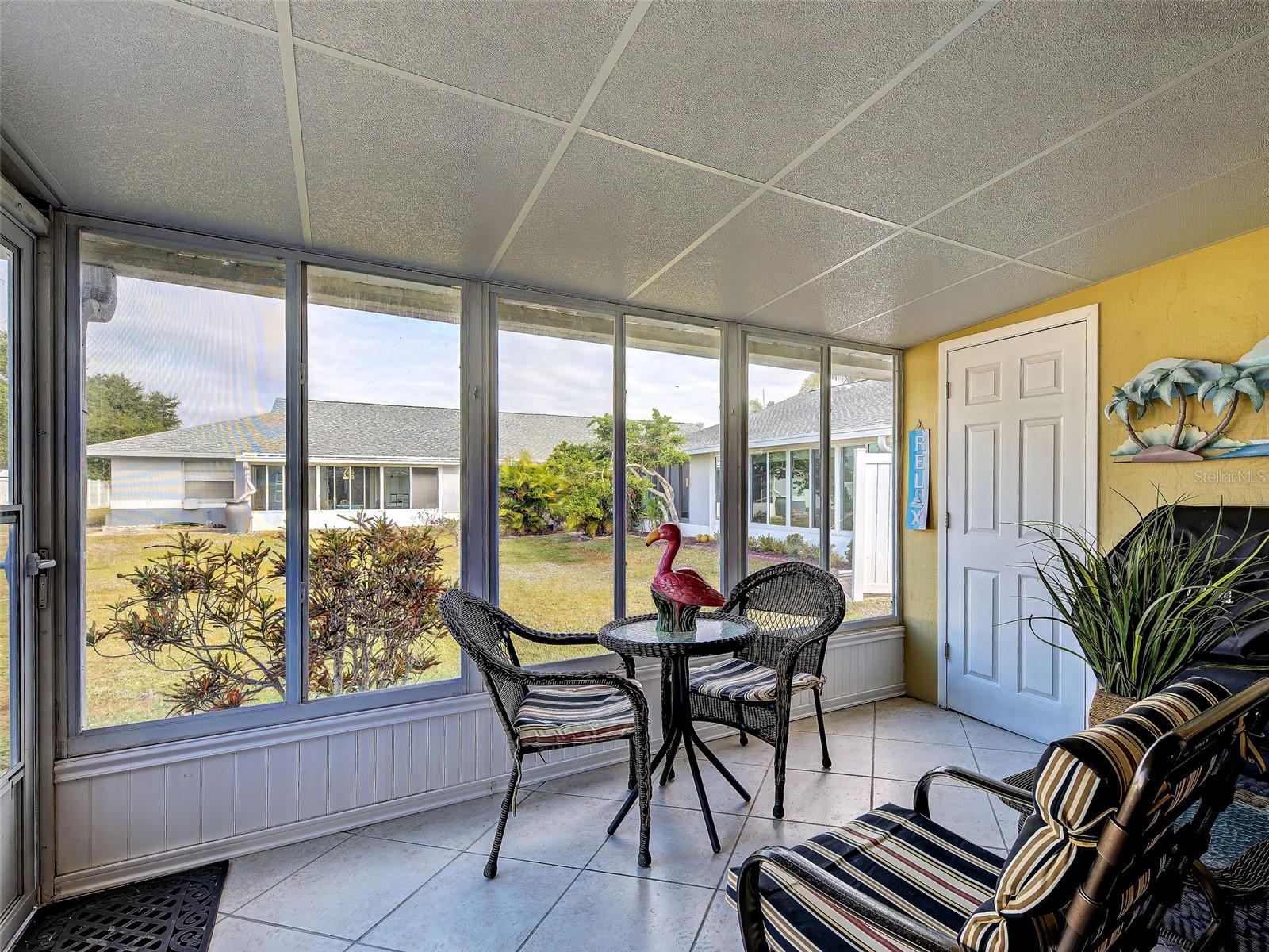 lLanai....tiled flooring, enclosed with glass sliding doors/screens. All year use. Storage closet - 6527 HAMLET DR #26B, ENGLEWOOD