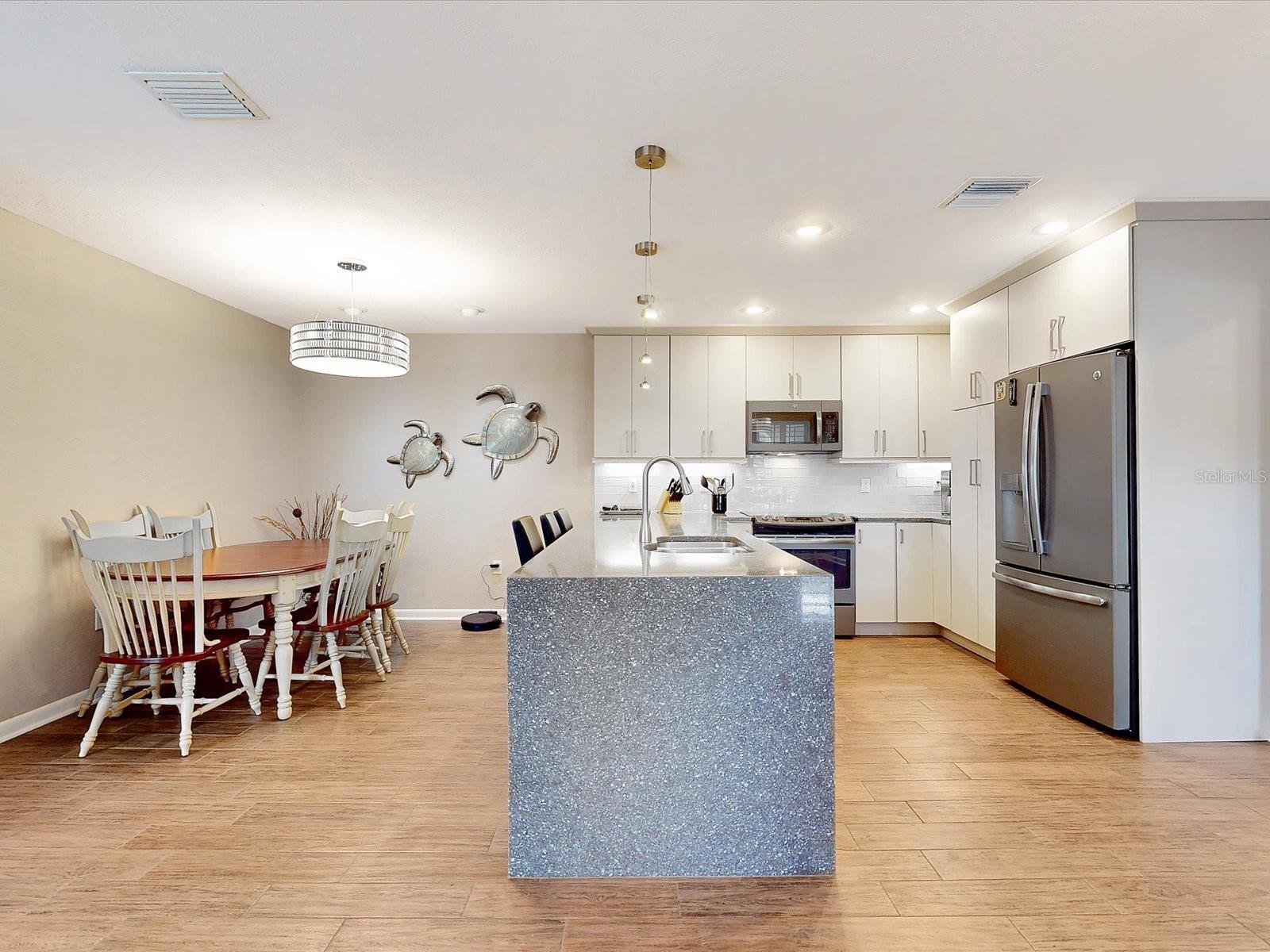 View into the kitchen area - 112 COVENTRY LN, HAINES CITY