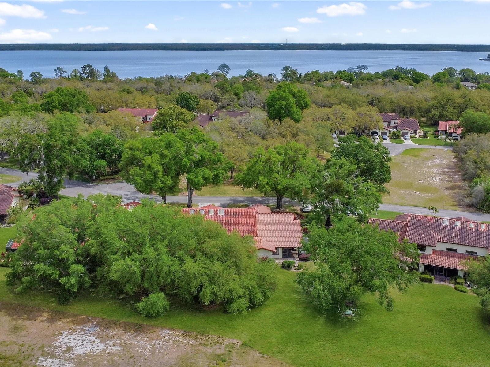 See that clean roof at the middle of this picture. That is 112 Coventry Ln - 112 COVENTRY LN, HAINES CITY