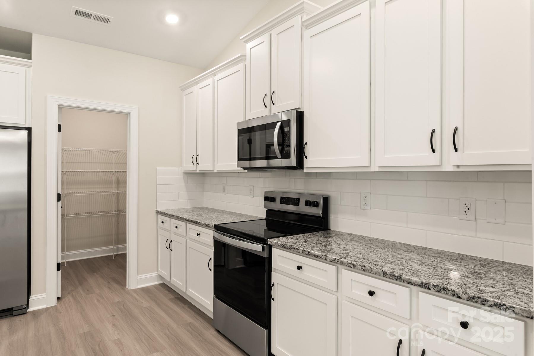 Single Family Residence at 125 Colonial Reserve Avenue, Troutman, photo 8 of 20