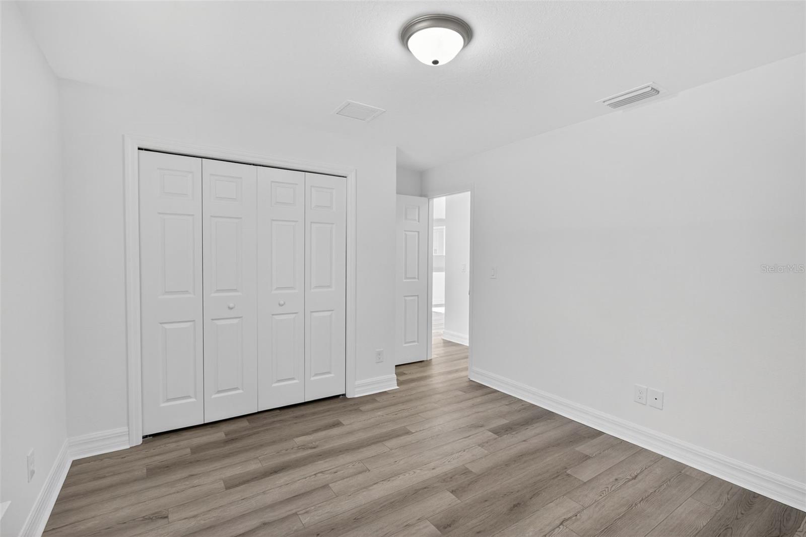 Third bedroom with view of closet - 11145 2ND AVE, PUNTA GORDA