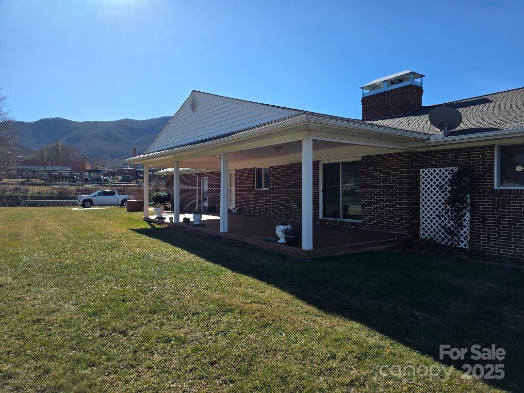 Covered patio at the rear of the house - 1375 E US Highway 19E Highway, Burnsville