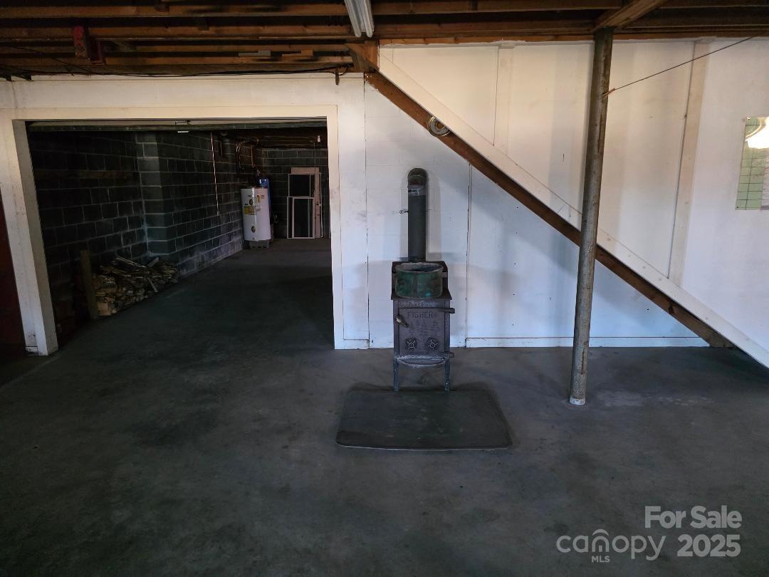 Wood stove in basement - 1375 E US Highway 19E Highway, Burnsville