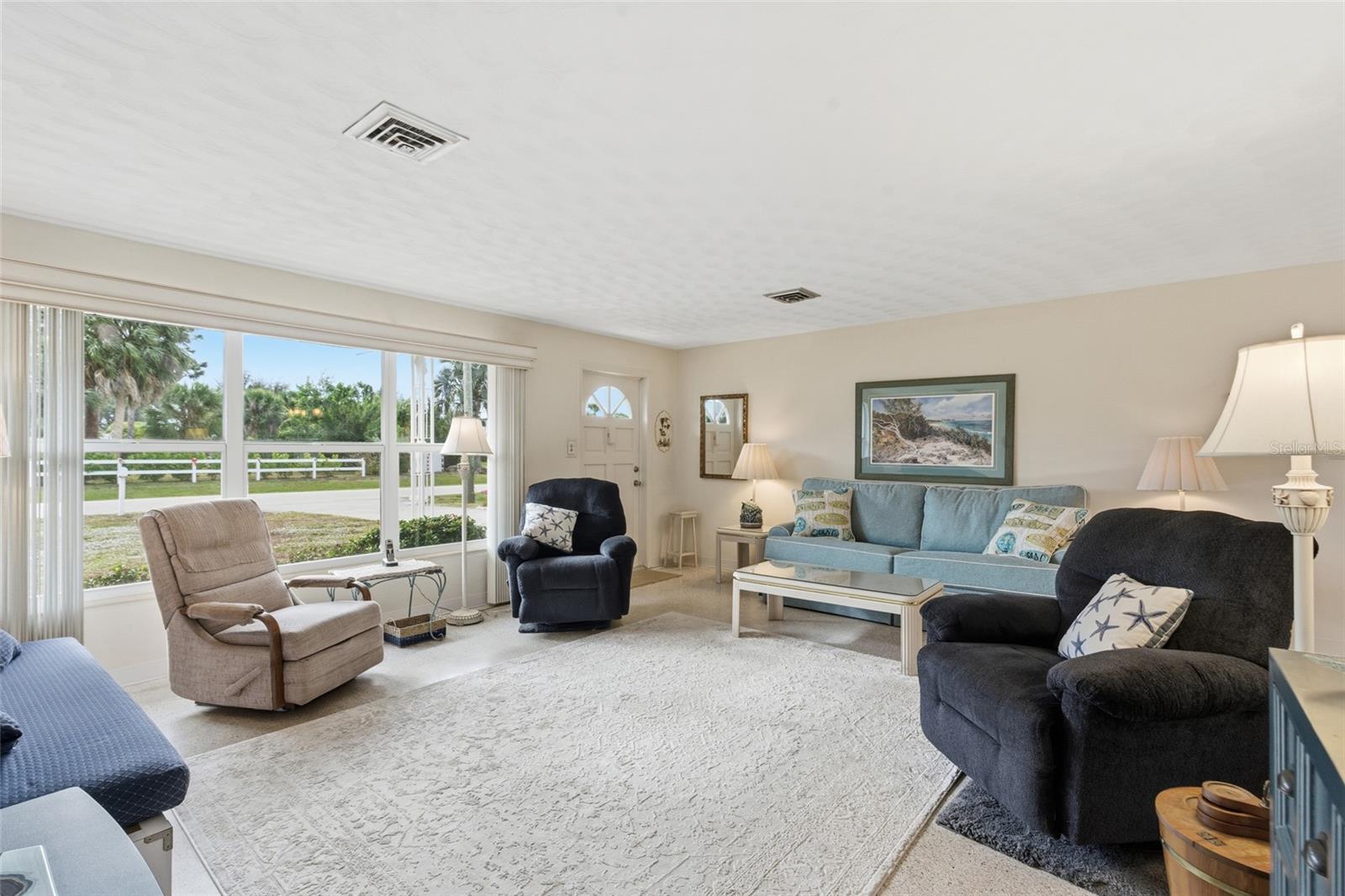 LIVING ROOM - GREAT NATURAL LIGHT - 2050 OYSTER CREEK DR, ENGLEWOOD