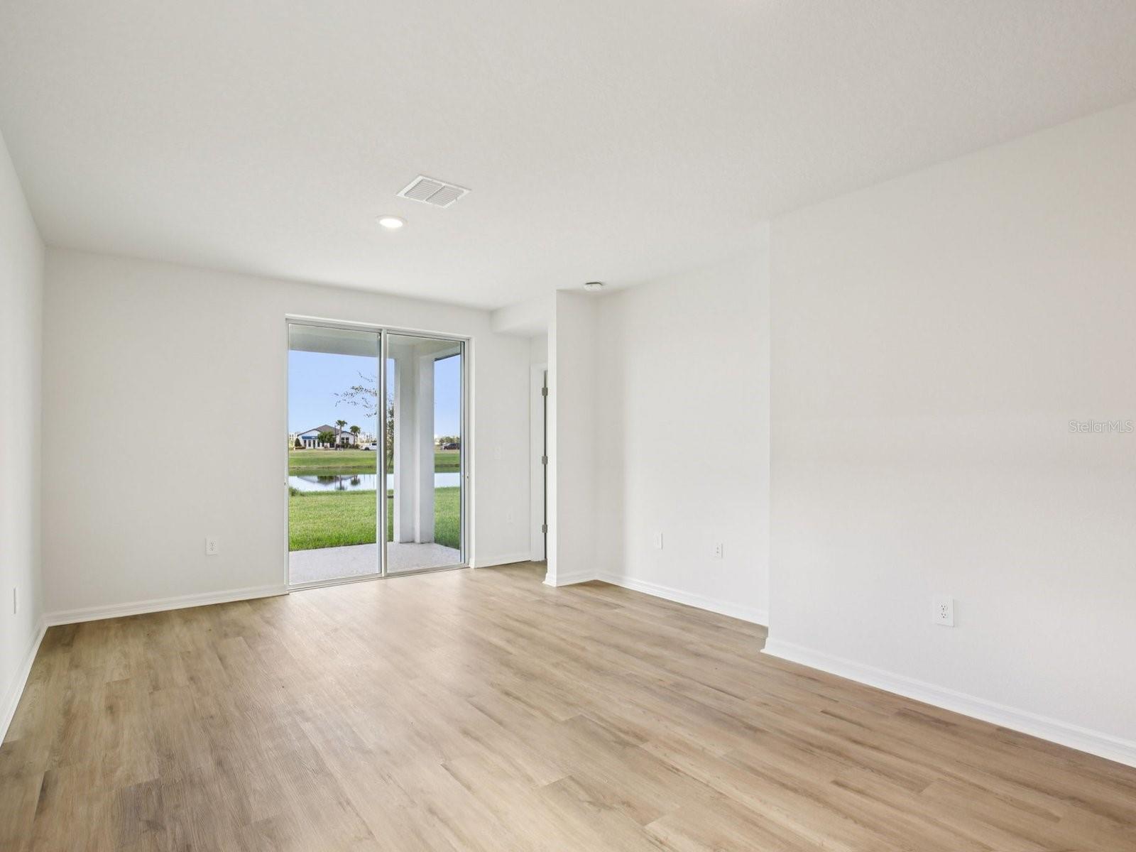 Interior photos are not of the actual home but are photos of the builder home with the same floorplan with similar interior finishes and features. - 11321 BELLEWOOD TER, PARRISH