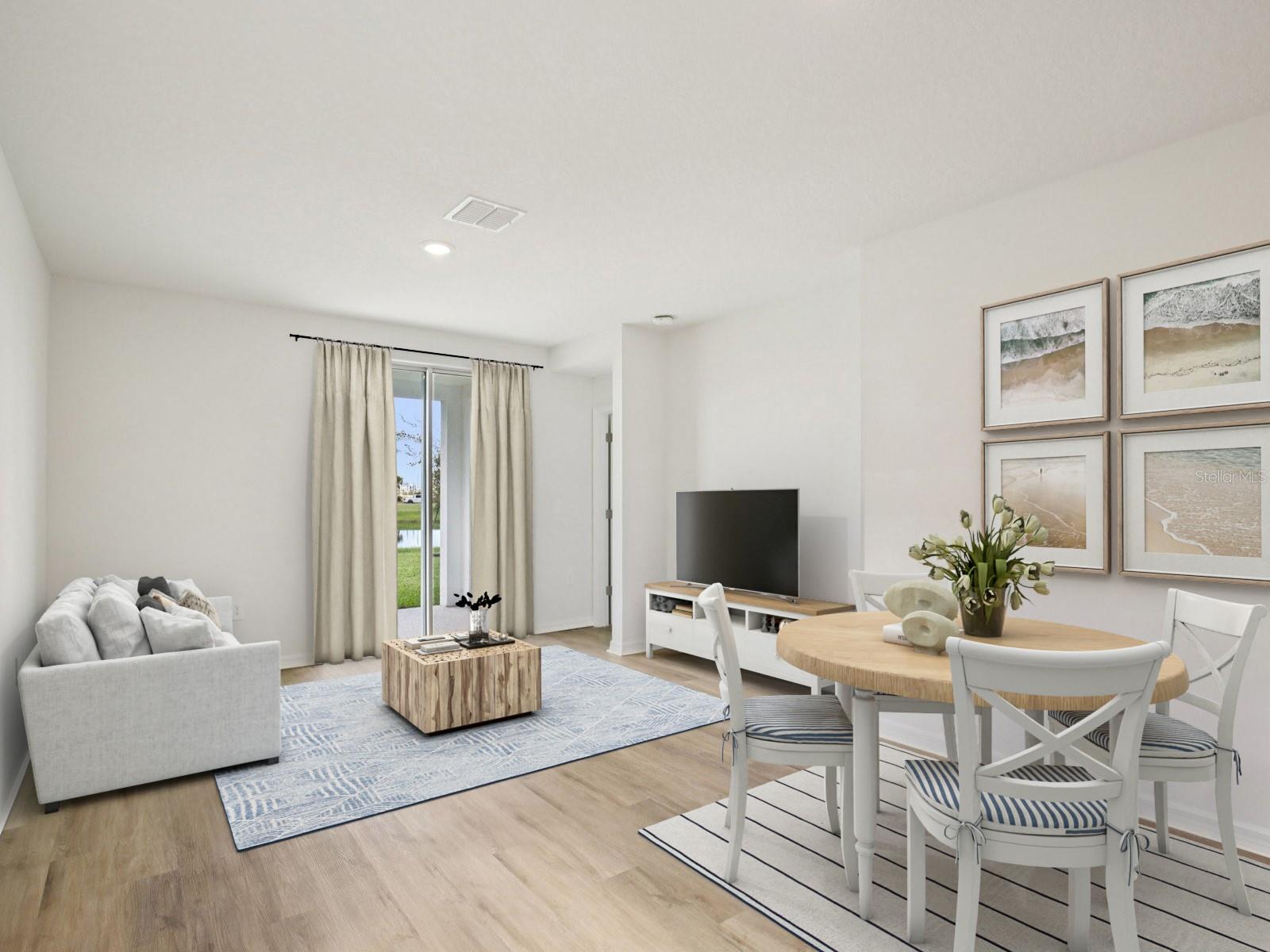 Interior photos are not of the actual home but are photos of the builder home with same floorplan with similar interior finishes and features. Photo uses virtual staging. - 11321 BELLEWOOD TER, PARRISH