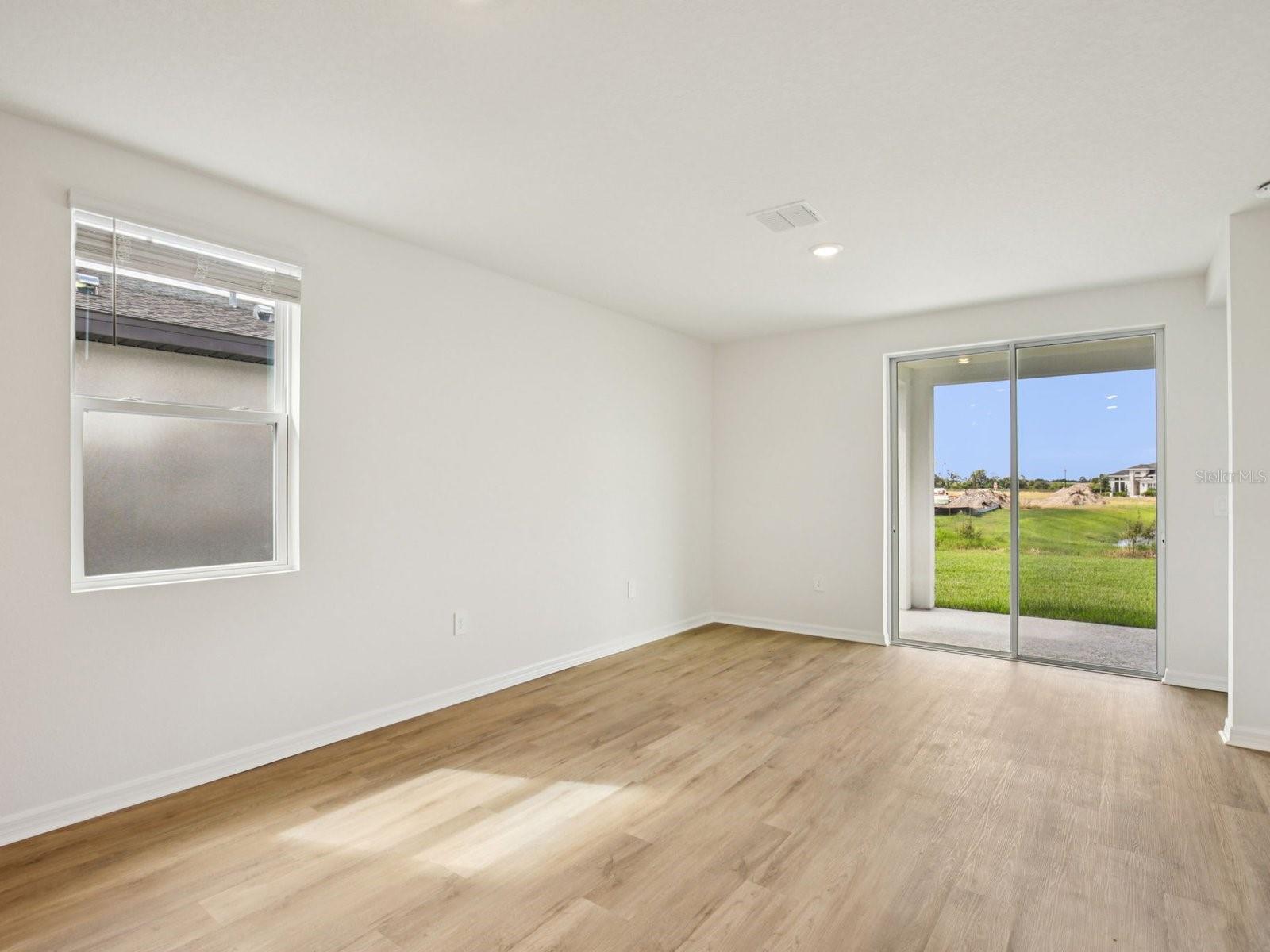 Interior photos are not of the actual home but are photos of the builder home with the same floorplan with similar interior finishes and features. - 11321 BELLEWOOD TER, PARRISH