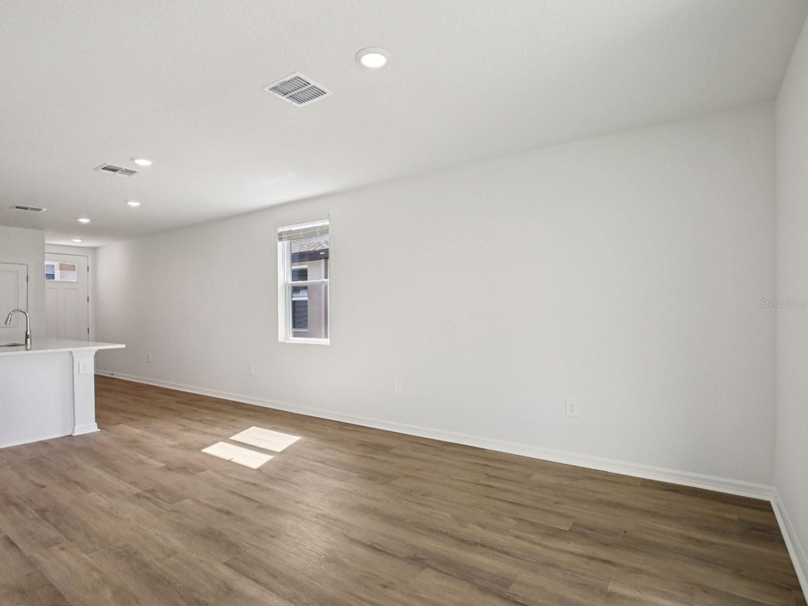 Interior photos are not of the actual home but are photos of the builder home with the same floorplan with similar interior finishes and features. - 11321 BELLEWOOD TER, PARRISH