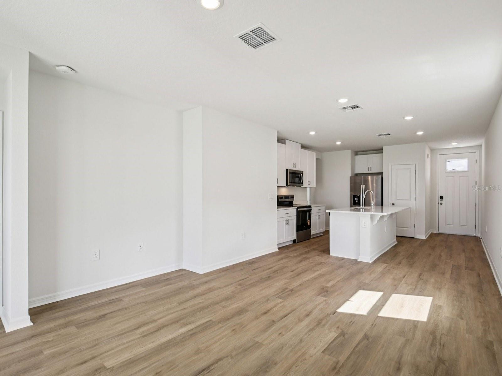 Interior photos are not of the actual home but are photos of the builder home with the same floorplan with similar interior finishes and features. - 11321 BELLEWOOD TER, PARRISH