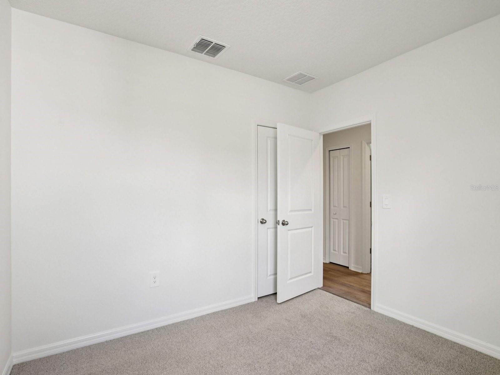 Interior photos are not of the actual home but are photos of the builder home with the same floorplan with similar interior finishes and features. - 11321 BELLEWOOD TER, PARRISH