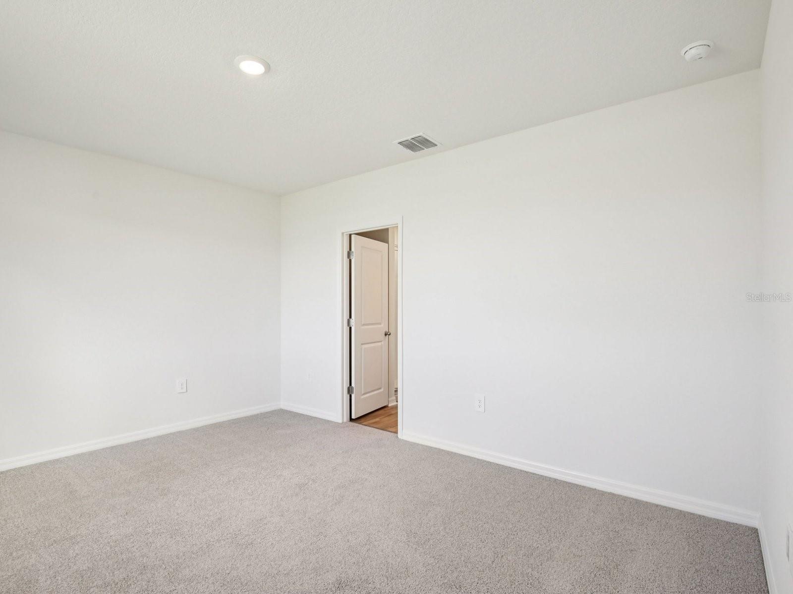 Interior photos are not of the actual home but are photos of the builder home with the same floorplan with similar interior finishes and features. - 11321 BELLEWOOD TER, PARRISH