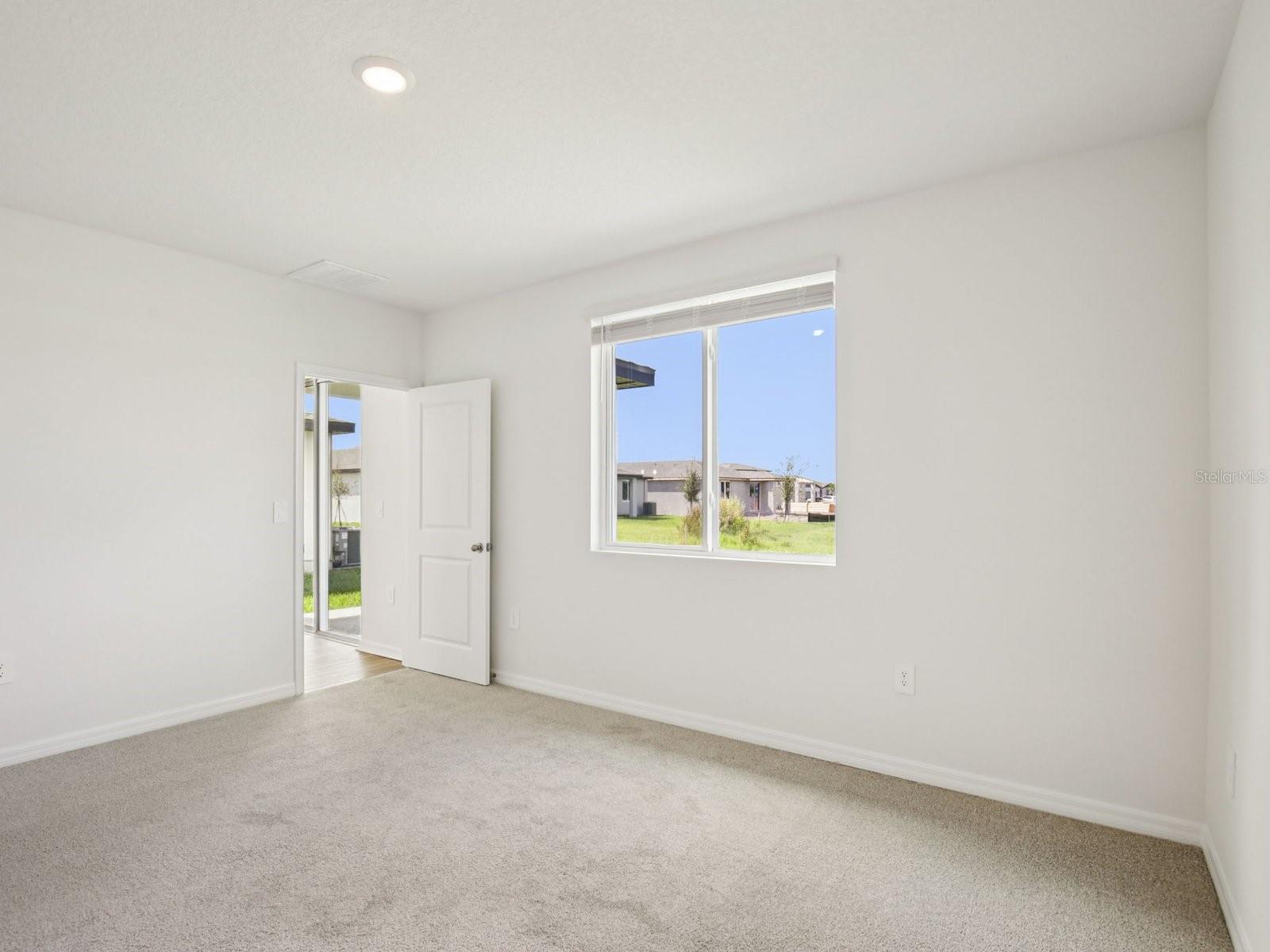 Interior photos are not of the actual home but are photos of the builder home with the same floorplan with similar interior finishes and features. - 11321 BELLEWOOD TER, PARRISH