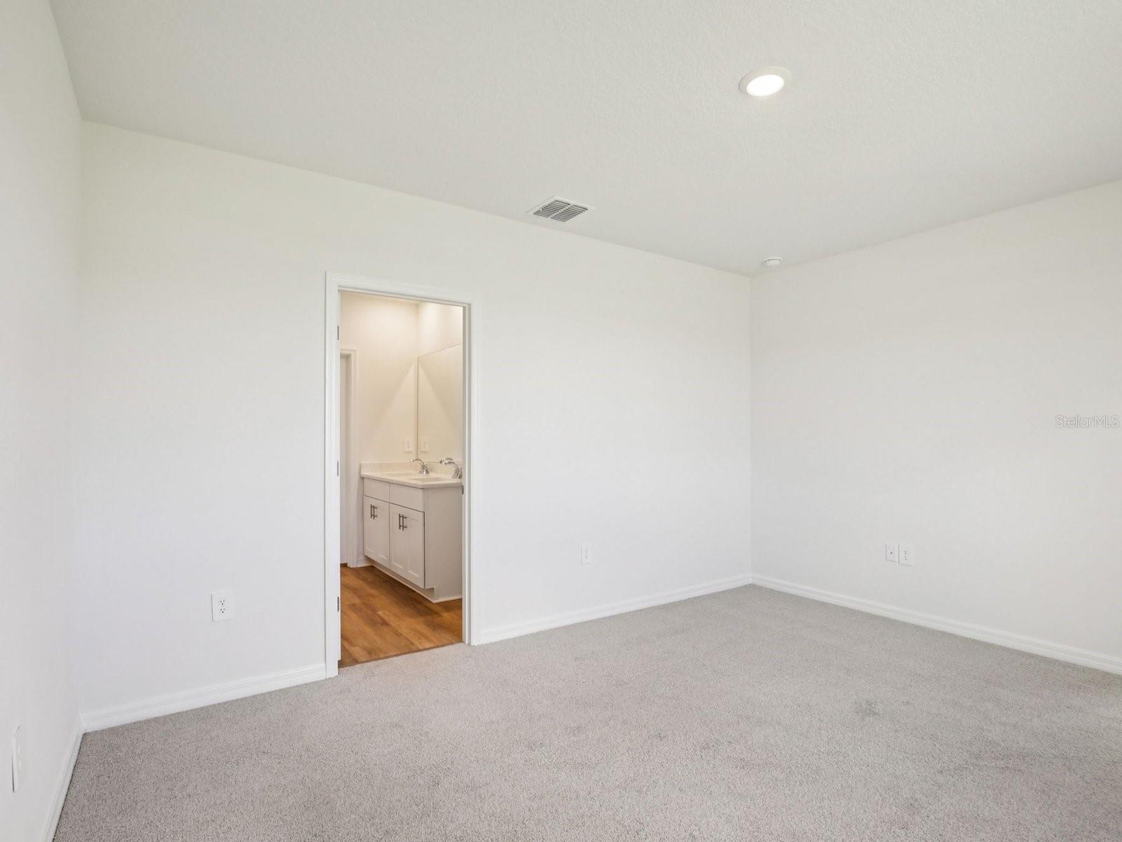 Interior photos are not of the actual home but are photos of the builder home with the same floorplan with similar interior finishes and features. - 11321 BELLEWOOD TER, PARRISH