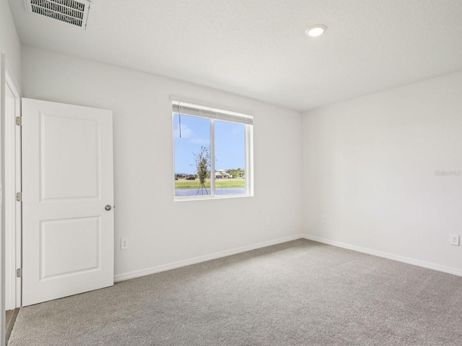 Interior photos are not of the actual home but are photos of the builder home with the same floorplan with similar interior finishes and features. - 11321 BELLEWOOD TER, PARRISH