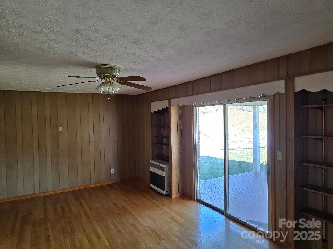 Den with ceiling fan, hardwood floors - 1375 E US Highway 19E Highway, Burnsville