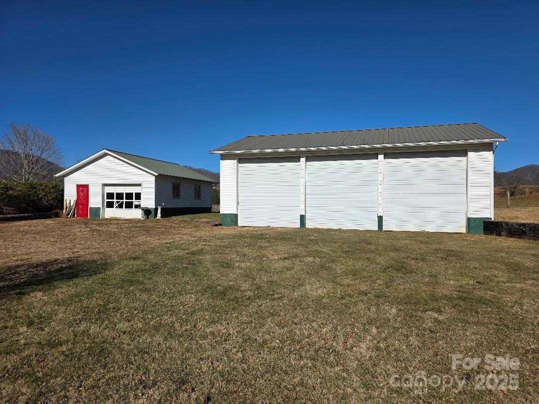 Three car RV garage and one car garage and shop - 1375 E US Highway 19E Highway, Burnsville