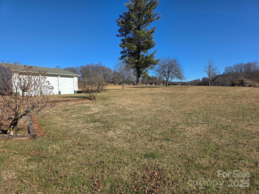 View looking east toward the cemetery - 1375 E US Highway 19E Highway, Burnsville