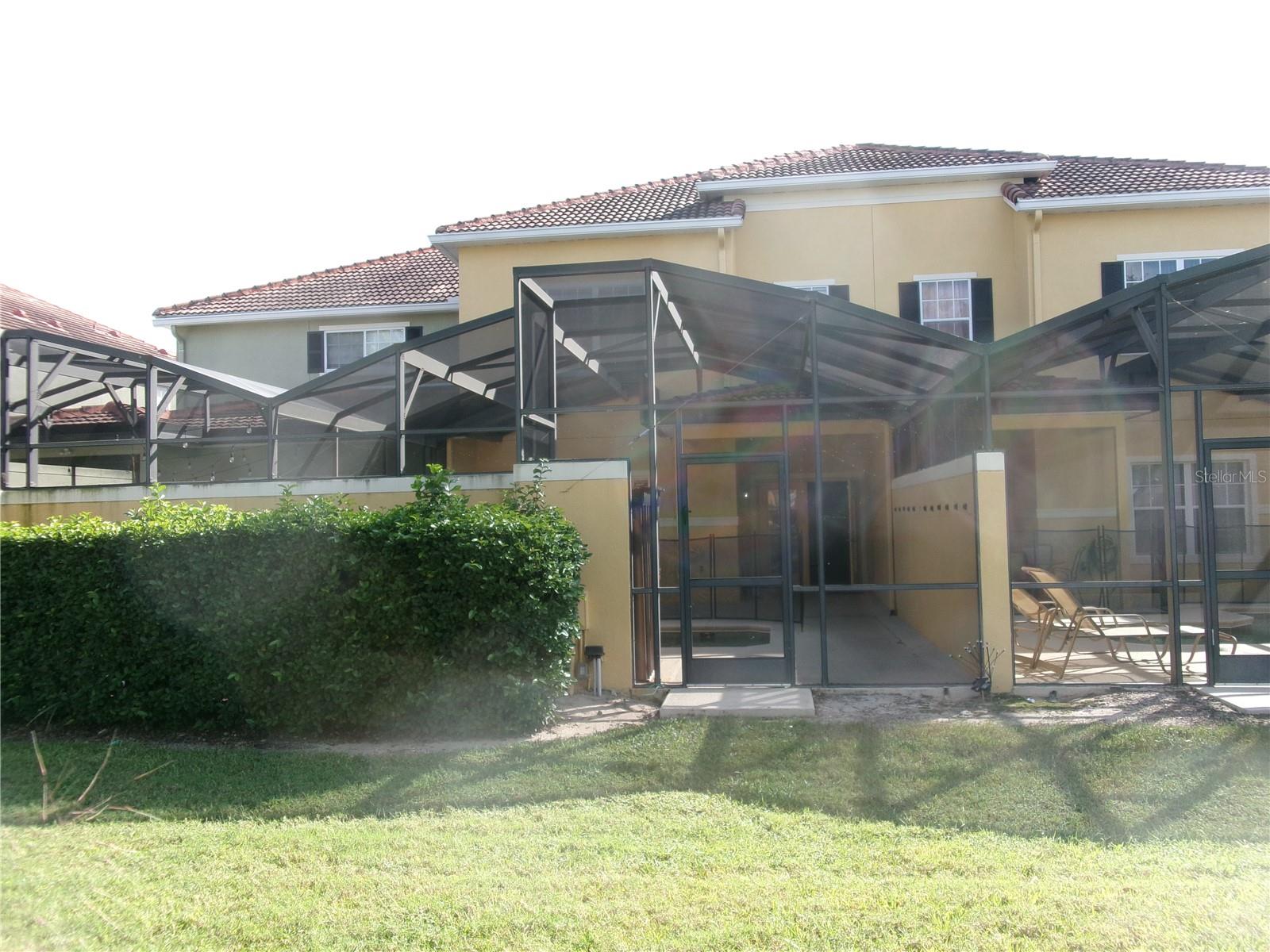 Rear side - 8969 MAJESTY PALM RD, KISSIMMEE