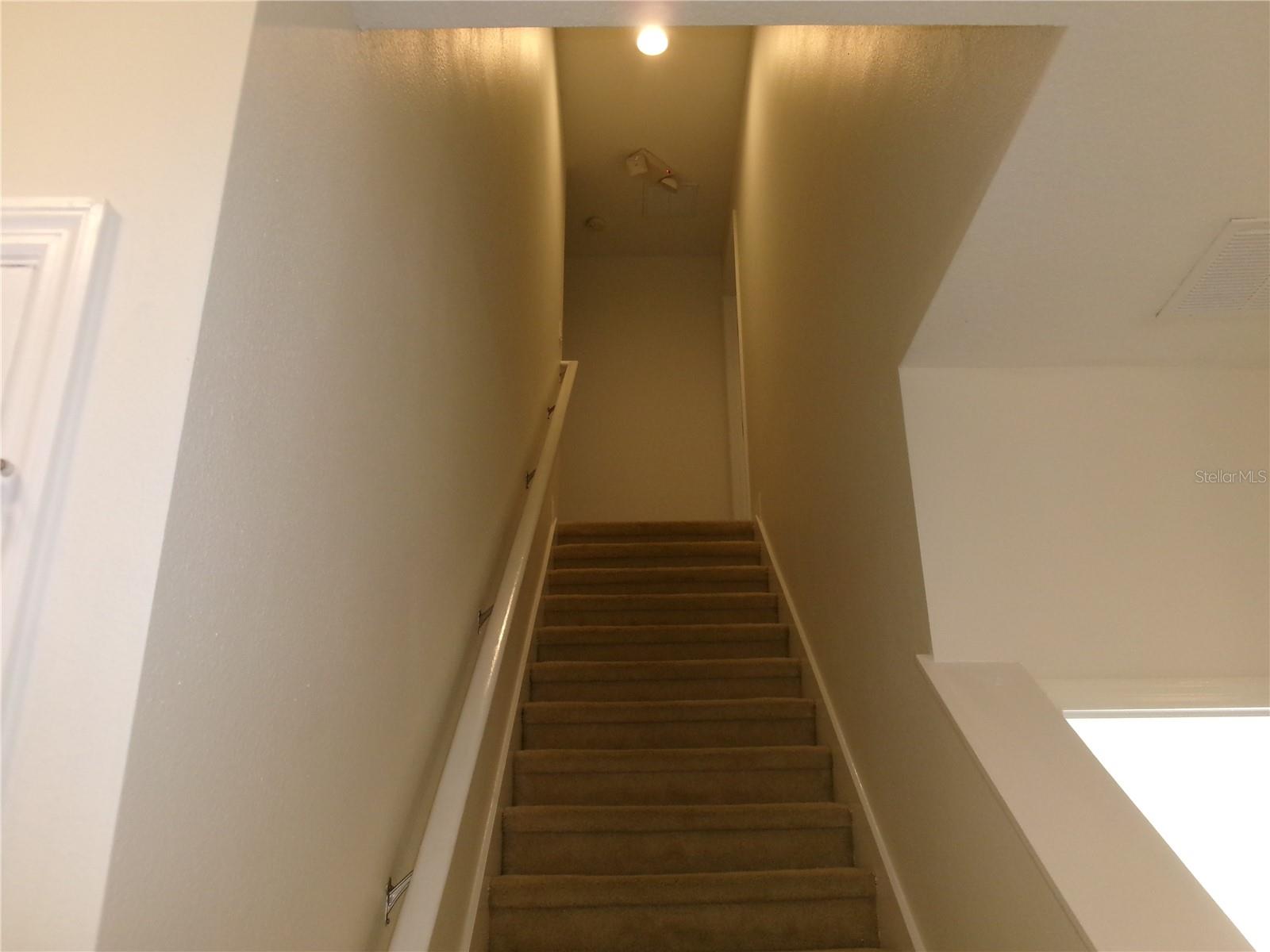 Stairs to second floor - 8969 MAJESTY PALM RD, KISSIMMEE