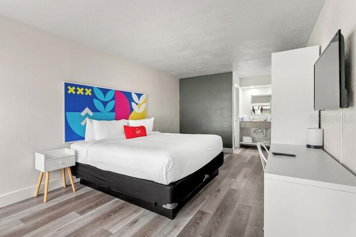 Furnished unit with wall-mounted TV - 2930 POLYNESIAN ISLE BLVD #245, KISSIMMEE
