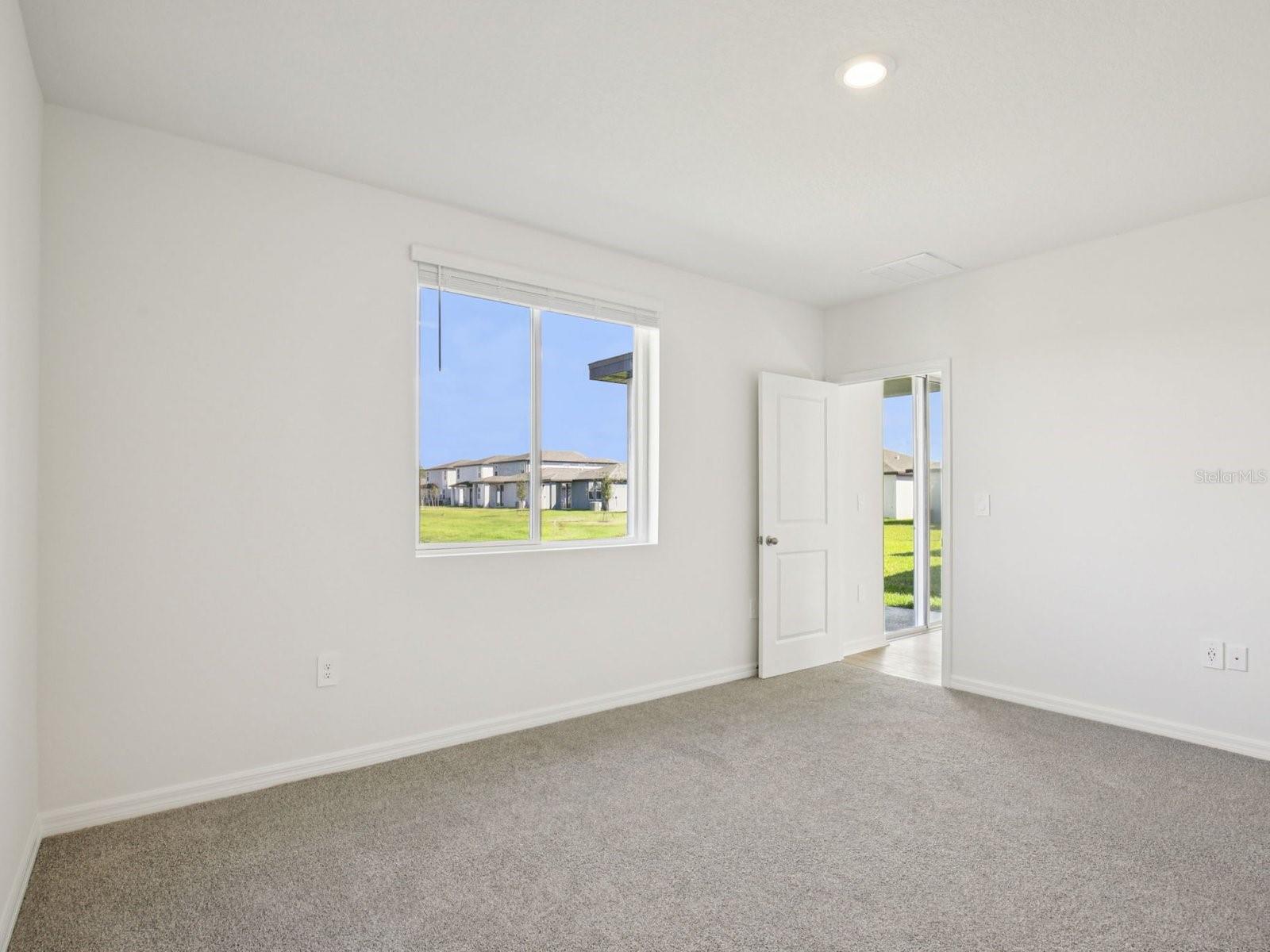 Interior photos are not of the actual home but are photos of the builder home with same floorplan with similar interior finishes and features. - 11255 BELLEWOOD TER, PARRISH
