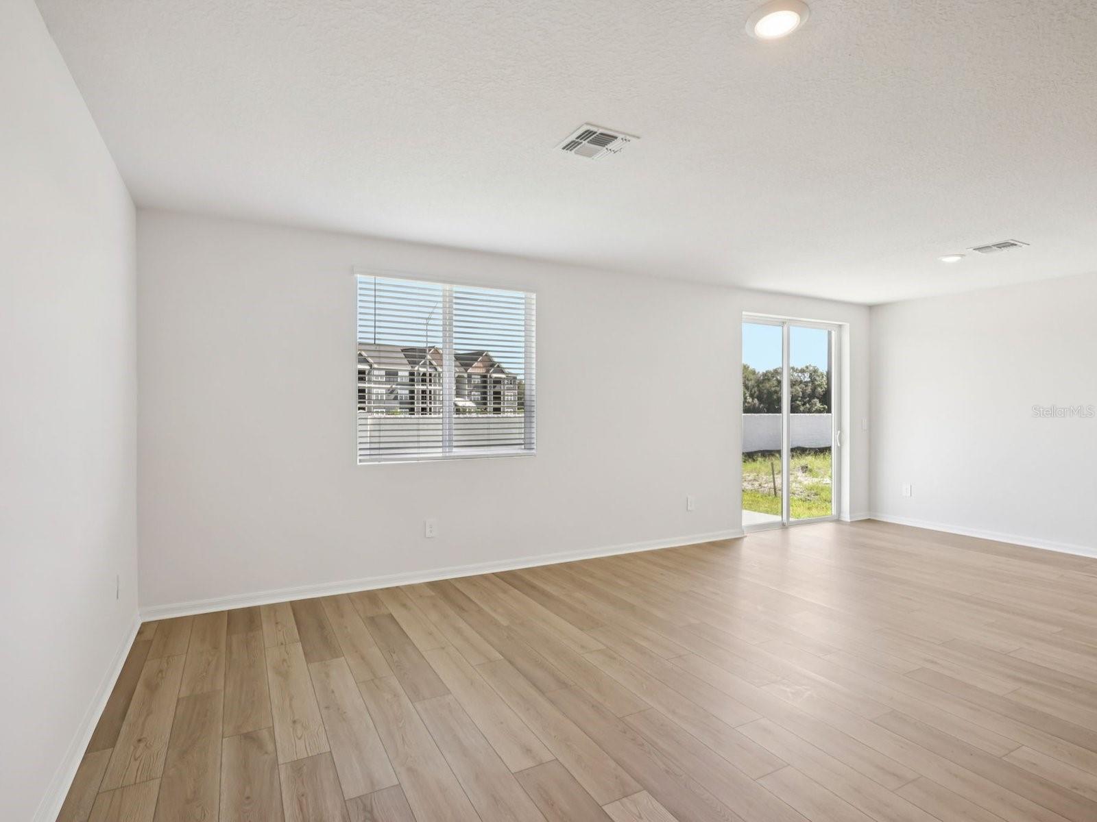 Interior photos are not of the actual home but are photos of the builder home with same floorplan with similar interior finishes and features. - 10425 ABUNDANCE GROVE WAY, PARRISH