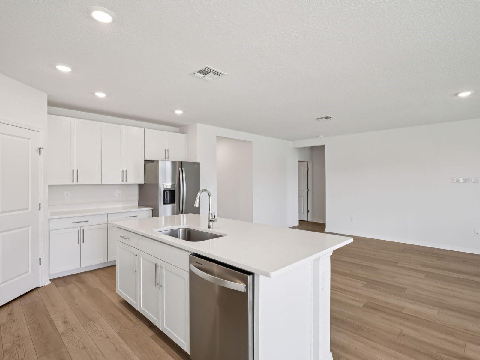 Interior photos are not of the actual home but are photos of the builder home with same floorplan with similar interior finishes and features. - 10425 ABUNDANCE GROVE WAY, PARRISH