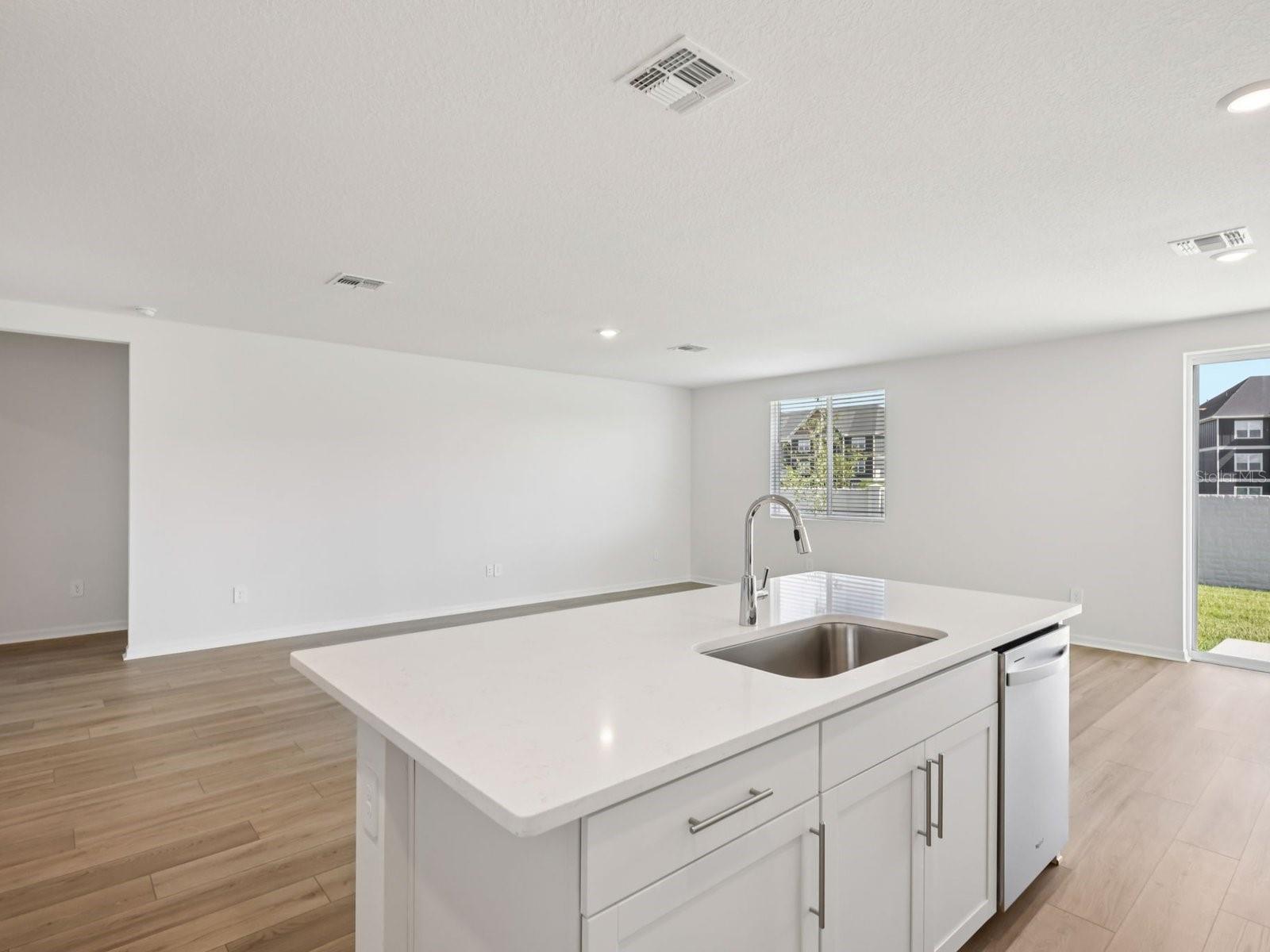 Interior photos are not of the actual home but are photos of the builder home with same floorplan with similar interior finishes and features. - 10425 ABUNDANCE GROVE WAY, PARRISH