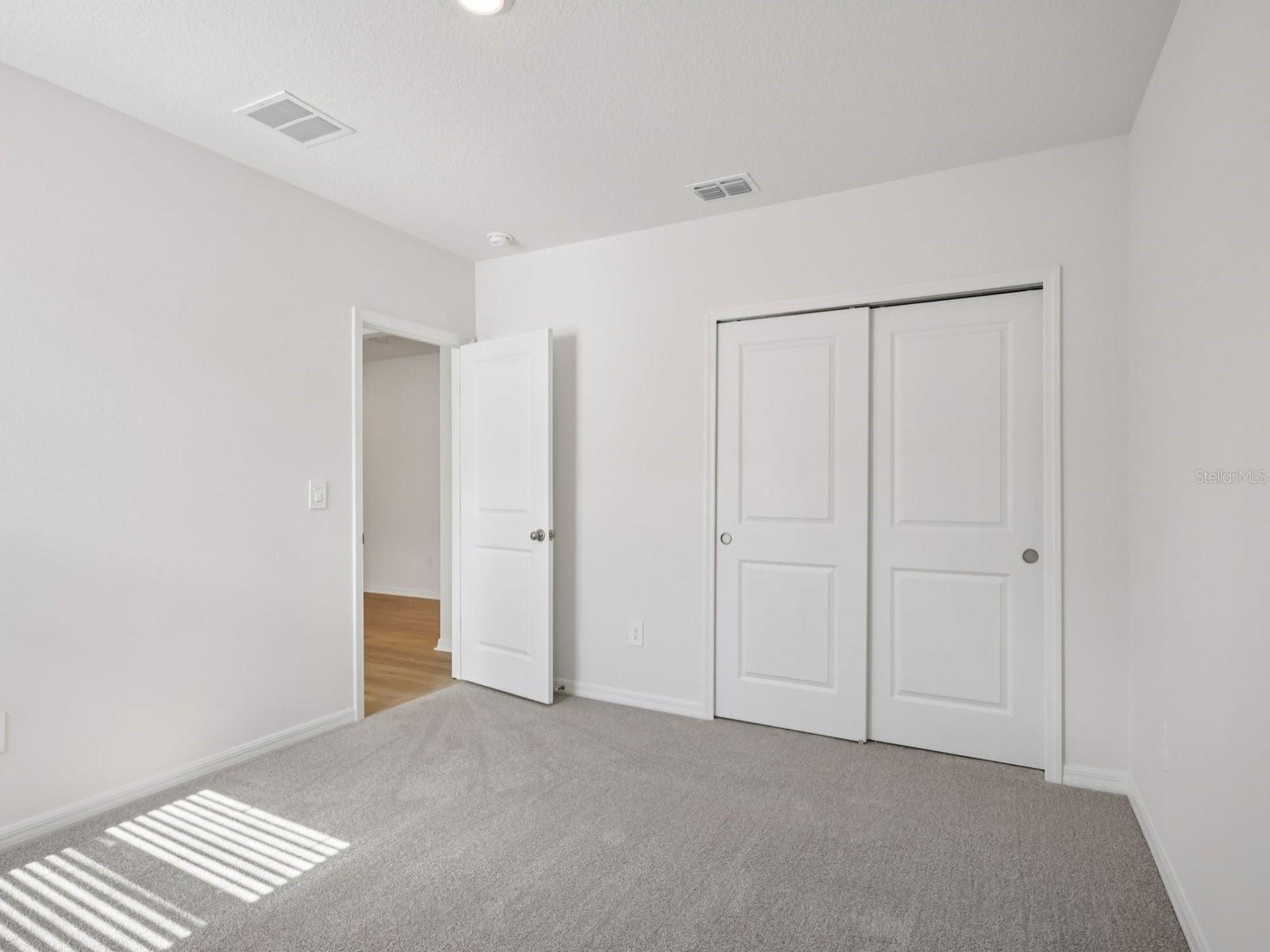 Interior photos are not of the actual home but are photos of the builder home with same floorplan with similar interior finishes and features. - 10425 ABUNDANCE GROVE WAY, PARRISH