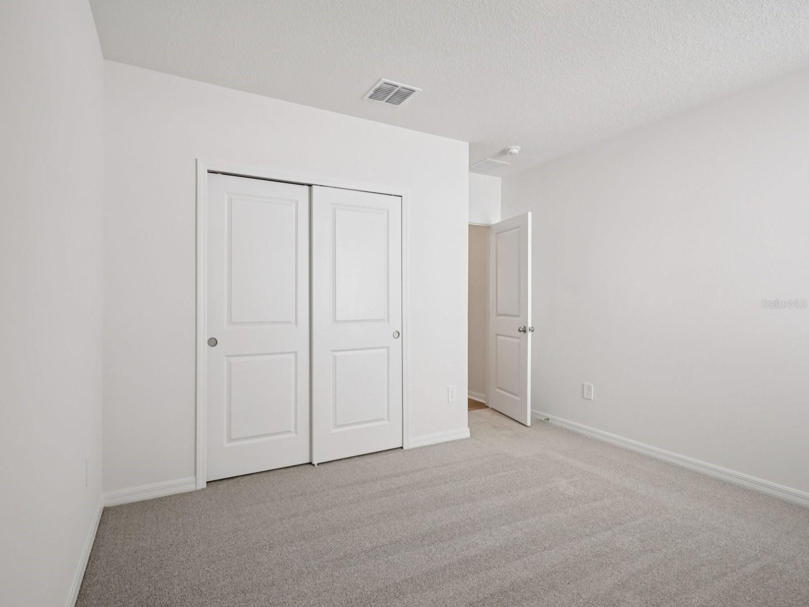 Interior photos are not of the actual home but are photos of the builder home with same floorplan with similar interior finishes and features. - 10425 ABUNDANCE GROVE WAY, PARRISH